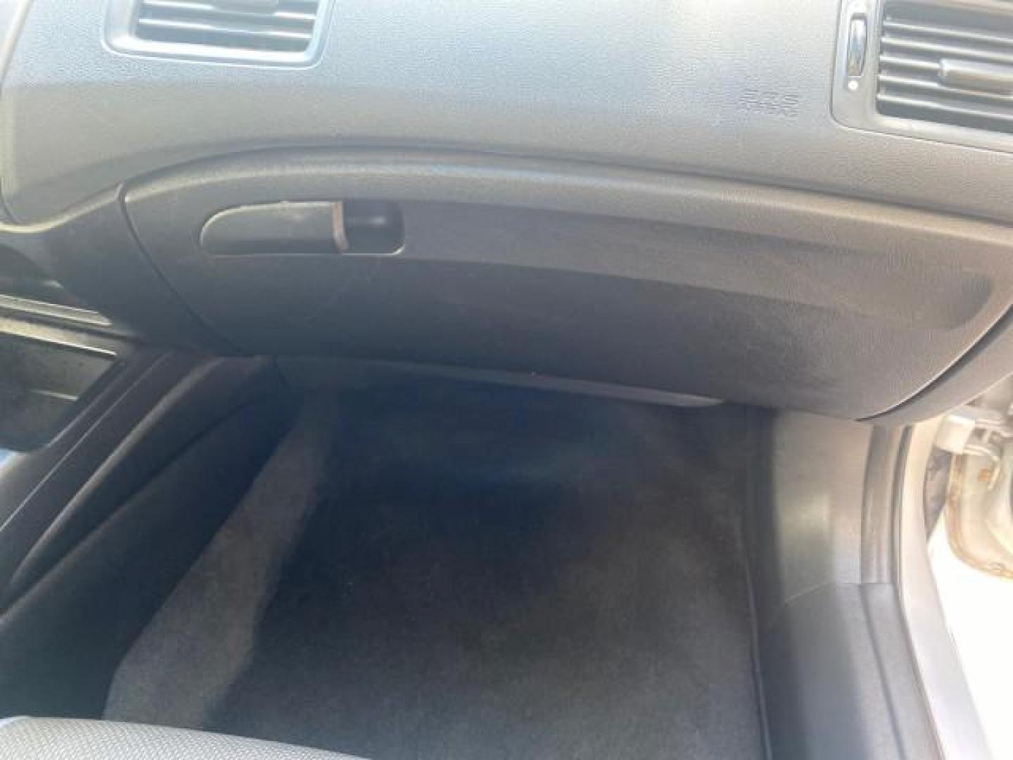 2009 Alabaster Silver Metallic /Black Honda Civic Sdn 1 OWNER FL LOW MILES 36,489 LX-S (2HGFA16609H) with an 1.8L SOHC MPFI 16-Valve i-VTEC I4 Engine engine, Automatic transmission, located at 4701 North Dixie Hwy, Pompano Beach, FL, 33064, (954) 422-2889, 26.240938, -80.123474 - OUR WEBPAGE FLORIDACARS1.COM HAS OVER 100 PHOTOS AND FREE CARFAX LINK 2009 HONDA CIVIC LX-S 36 MPG VIN: 2HGFA16609H342129 2 H G F A 1 6 6 0 9 H 3 4 2 1 2 9 SEDAN 4 DR 1.8L I4 F SOHC 16V GASOLINE FRONT WHEEL DRIVE Top Features Alloy Wheels Cloth Seats Basic Features ABS Brakes Auxiliary Audio Input P - Photo#92