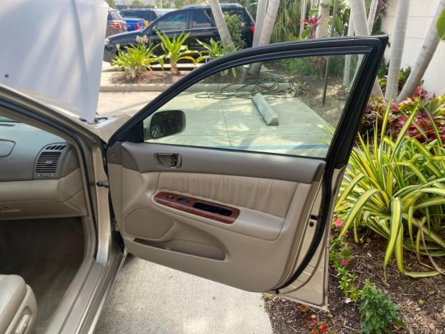 2005 Desert Sand Mica /Taupe Toyota Camry XLE V6 SUNROOF LEATHER (4T1BF30K35U) with an 3.0L DOHC MPFI Vvti 24-Valve V6 Engine engine, Automatic transmission, located at 4701 North Dixie Hwy, Pompano Beach, FL, 33064, (954) 422-2889, 26.240938, -80.123474 - OUR WEBPAGE FLORIDACARS1.COM HAS OVER 100 PHOTOS AND FREE CARFAX LINK 2005 TOYOTA CAMRY LE V6 SUNROOF LEATHER BUCKET SEATS VIN: 4T1BF30K35U597683 4 T 1 B F 3 0 K 3 5 U 5 9 7 6 8 3 SEDAN 4 DR 3.0L V6 F DOHC 24V GASOLINE 28 MPG FRONT WHEEL DRIVE TIRES ARE NEW ! Top Features Alloy Wheels Luxury Package - Photo#11