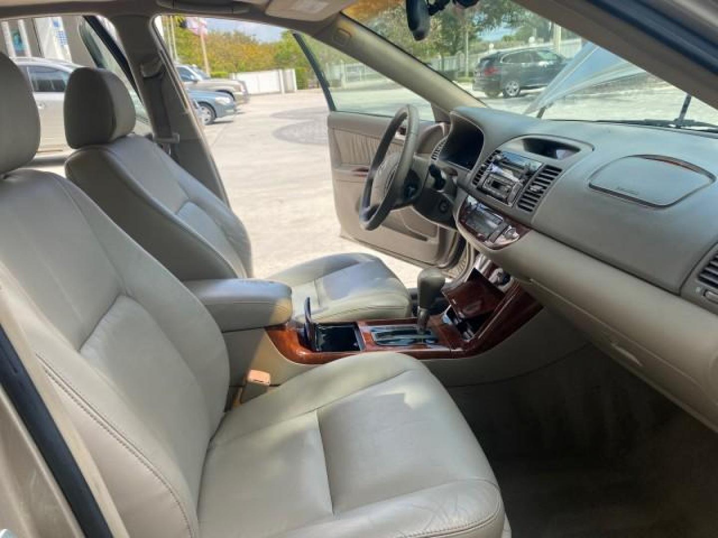 2005 Desert Sand Mica /Taupe Toyota Camry XLE V6 SUNROOF LEATHER (4T1BF30K35U) with an 3.0L DOHC MPFI Vvti 24-Valve V6 Engine engine, Automatic transmission, located at 4701 North Dixie Hwy, Pompano Beach, FL, 33064, (954) 422-2889, 26.240938, -80.123474 - OUR WEBPAGE FLORIDACARS1.COM HAS OVER 100 PHOTOS AND FREE CARFAX LINK 2005 TOYOTA CAMRY LE V6 SUNROOF LEATHER BUCKET SEATS VIN: 4T1BF30K35U597683 4 T 1 B F 3 0 K 3 5 U 5 9 7 6 8 3 SEDAN 4 DR 3.0L V6 F DOHC 24V GASOLINE 28 MPG FRONT WHEEL DRIVE TIRES ARE NEW ! Top Features Alloy Wheels Luxury Package - Photo#12