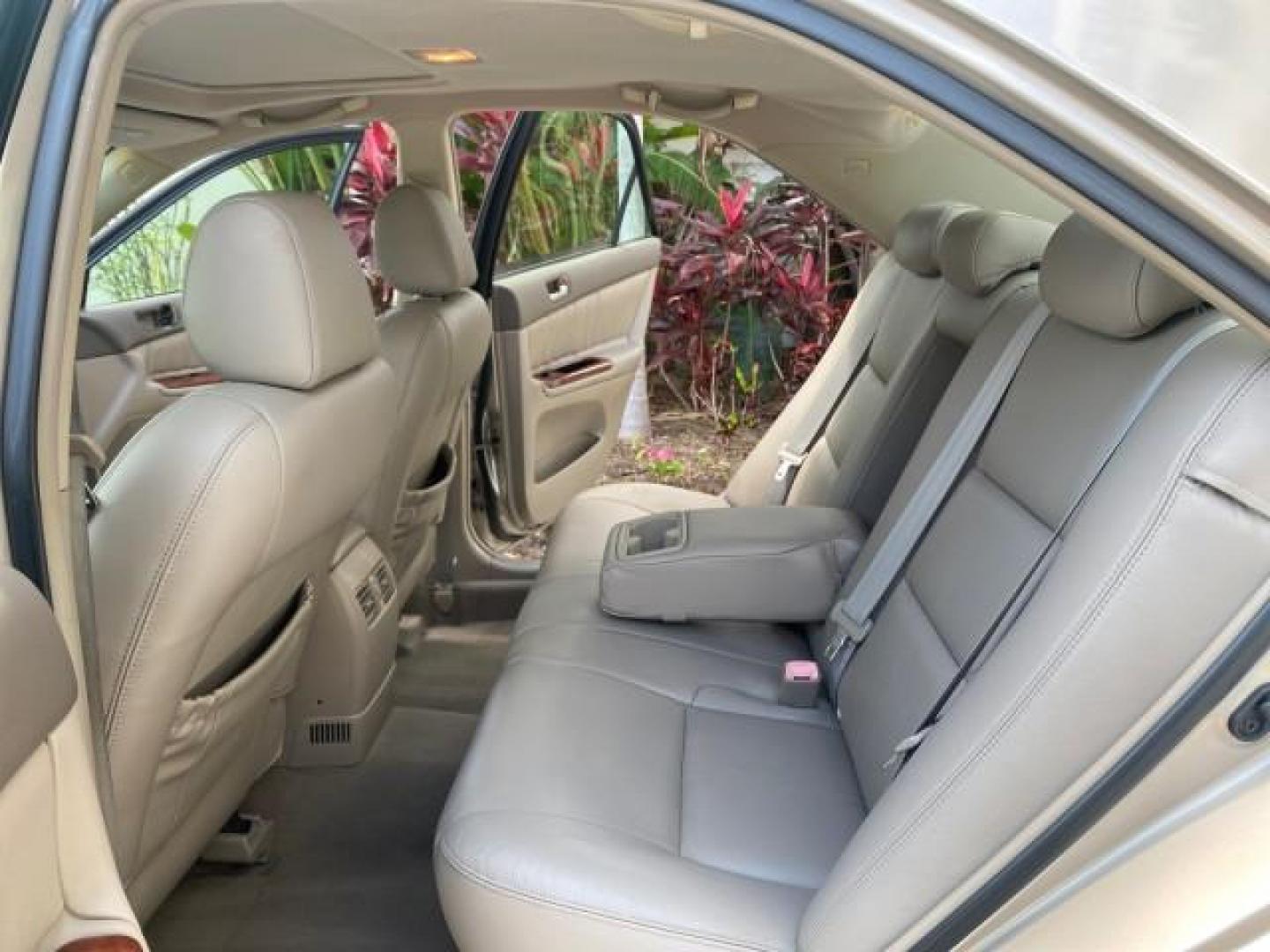 2005 Desert Sand Mica /Taupe Toyota Camry XLE V6 SUNROOF LEATHER (4T1BF30K35U) with an 3.0L DOHC MPFI Vvti 24-Valve V6 Engine engine, Automatic transmission, located at 4701 North Dixie Hwy, Pompano Beach, FL, 33064, (954) 422-2889, 26.240938, -80.123474 - OUR WEBPAGE FLORIDACARS1.COM HAS OVER 100 PHOTOS AND FREE CARFAX LINK 2005 TOYOTA CAMRY LE V6 SUNROOF LEATHER BUCKET SEATS VIN: 4T1BF30K35U597683 4 T 1 B F 3 0 K 3 5 U 5 9 7 6 8 3 SEDAN 4 DR 3.0L V6 F DOHC 24V GASOLINE 28 MPG FRONT WHEEL DRIVE TIRES ARE NEW ! Top Features Alloy Wheels Luxury Package - Photo#14