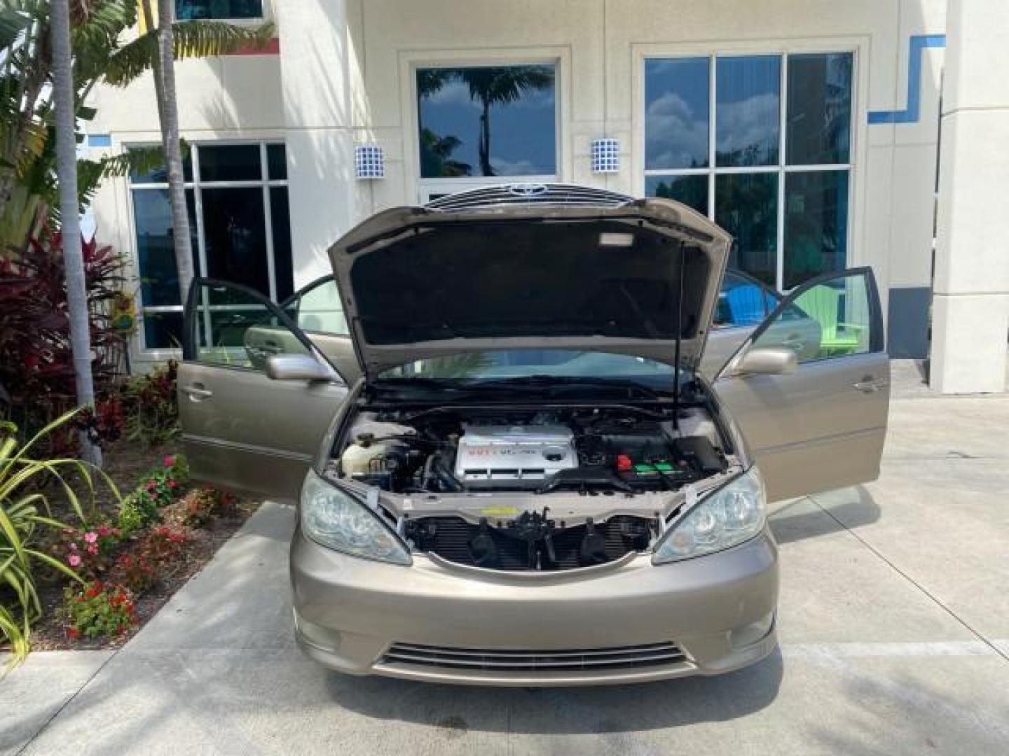 2005 Desert Sand Mica /Taupe Toyota Camry XLE V6 SUNROOF LEATHER (4T1BF30K35U) with an 3.0L DOHC MPFI Vvti 24-Valve V6 Engine engine, Automatic transmission, located at 4701 North Dixie Hwy, Pompano Beach, FL, 33064, (954) 422-2889, 26.240938, -80.123474 - OUR WEBPAGE FLORIDACARS1.COM HAS OVER 100 PHOTOS AND FREE CARFAX LINK 2005 TOYOTA CAMRY LE V6 SUNROOF LEATHER BUCKET SEATS VIN: 4T1BF30K35U597683 4 T 1 B F 3 0 K 3 5 U 5 9 7 6 8 3 SEDAN 4 DR 3.0L V6 F DOHC 24V GASOLINE 28 MPG FRONT WHEEL DRIVE TIRES ARE NEW ! Top Features Alloy Wheels Luxury Package - Photo#16