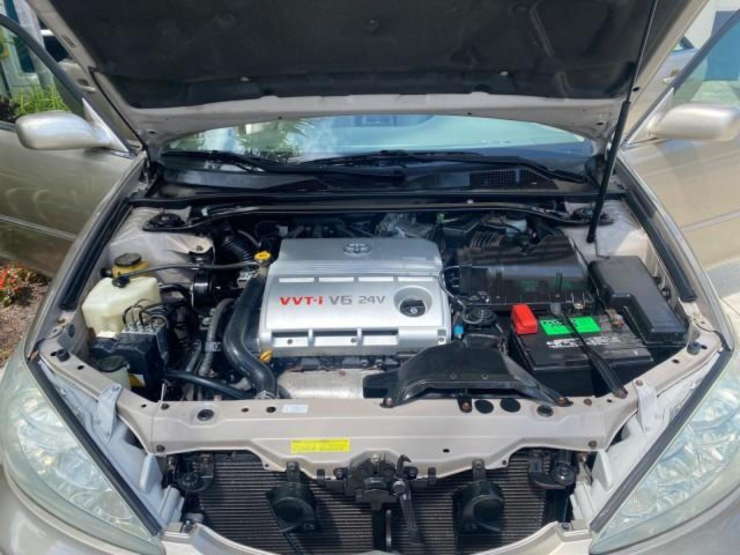 2005 Desert Sand Mica /Taupe Toyota Camry XLE V6 SUNROOF LEATHER (4T1BF30K35U) with an 3.0L DOHC MPFI Vvti 24-Valve V6 Engine engine, Automatic transmission, located at 4701 North Dixie Hwy, Pompano Beach, FL, 33064, (954) 422-2889, 26.240938, -80.123474 - OUR WEBPAGE FLORIDACARS1.COM HAS OVER 100 PHOTOS AND FREE CARFAX LINK 2005 TOYOTA CAMRY LE V6 SUNROOF LEATHER BUCKET SEATS VIN: 4T1BF30K35U597683 4 T 1 B F 3 0 K 3 5 U 5 9 7 6 8 3 SEDAN 4 DR 3.0L V6 F DOHC 24V GASOLINE 28 MPG FRONT WHEEL DRIVE TIRES ARE NEW ! Top Features Alloy Wheels Luxury Package - Photo#17