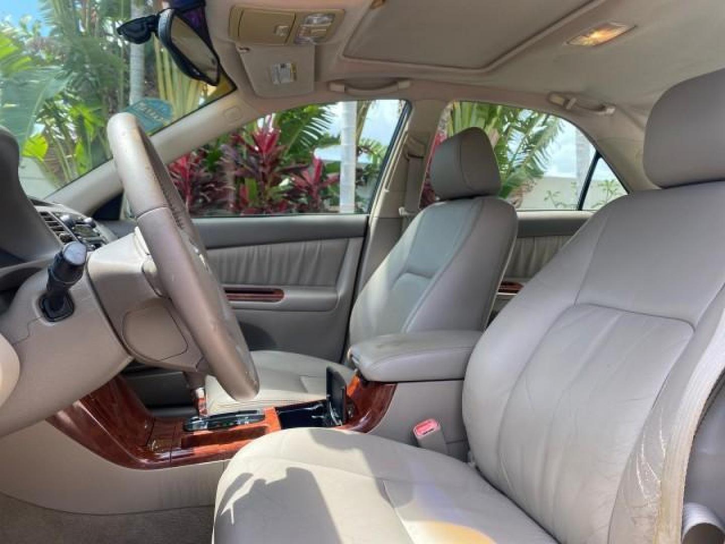 2005 Desert Sand Mica /Taupe Toyota Camry XLE V6 SUNROOF LEATHER (4T1BF30K35U) with an 3.0L DOHC MPFI Vvti 24-Valve V6 Engine engine, Automatic transmission, located at 4701 North Dixie Hwy, Pompano Beach, FL, 33064, (954) 422-2889, 26.240938, -80.123474 - OUR WEBPAGE FLORIDACARS1.COM HAS OVER 100 PHOTOS AND FREE CARFAX LINK 2005 TOYOTA CAMRY LE V6 SUNROOF LEATHER BUCKET SEATS VIN: 4T1BF30K35U597683 4 T 1 B F 3 0 K 3 5 U 5 9 7 6 8 3 SEDAN 4 DR 3.0L V6 F DOHC 24V GASOLINE 28 MPG FRONT WHEEL DRIVE TIRES ARE NEW ! Top Features Alloy Wheels Luxury Package - Photo#33