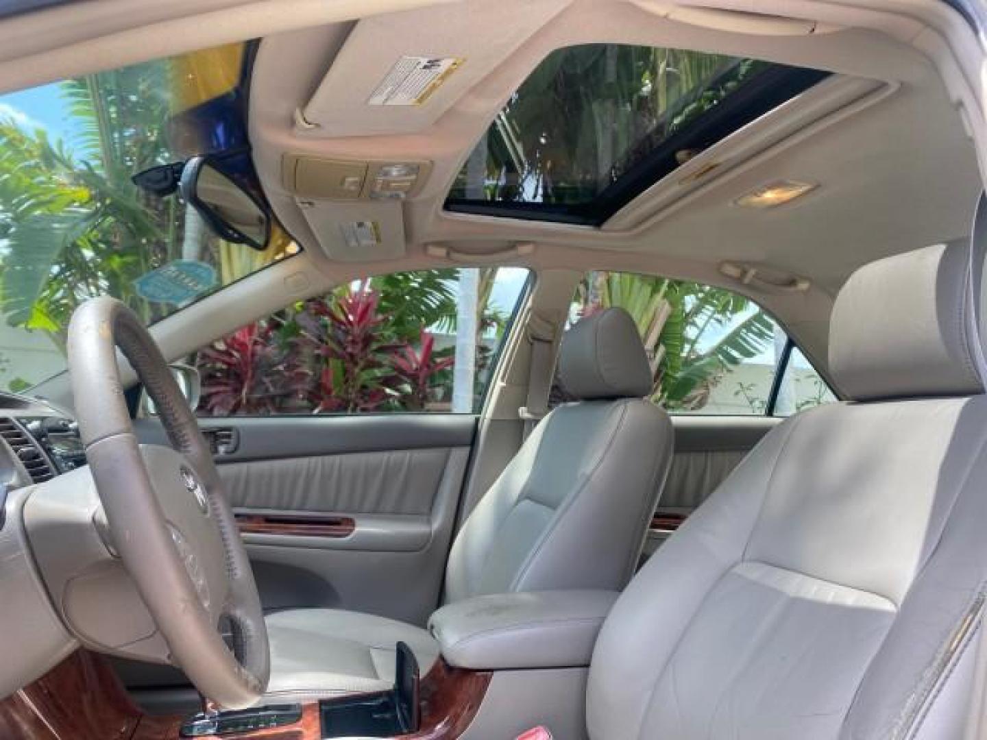 2005 Desert Sand Mica /Taupe Toyota Camry XLE V6 SUNROOF LEATHER (4T1BF30K35U) with an 3.0L DOHC MPFI Vvti 24-Valve V6 Engine engine, Automatic transmission, located at 4701 North Dixie Hwy, Pompano Beach, FL, 33064, (954) 422-2889, 26.240938, -80.123474 - OUR WEBPAGE FLORIDACARS1.COM HAS OVER 100 PHOTOS AND FREE CARFAX LINK 2005 TOYOTA CAMRY LE V6 SUNROOF LEATHER BUCKET SEATS VIN: 4T1BF30K35U597683 4 T 1 B F 3 0 K 3 5 U 5 9 7 6 8 3 SEDAN 4 DR 3.0L V6 F DOHC 24V GASOLINE 28 MPG FRONT WHEEL DRIVE TIRES ARE NEW ! Top Features Alloy Wheels Luxury Package - Photo#34