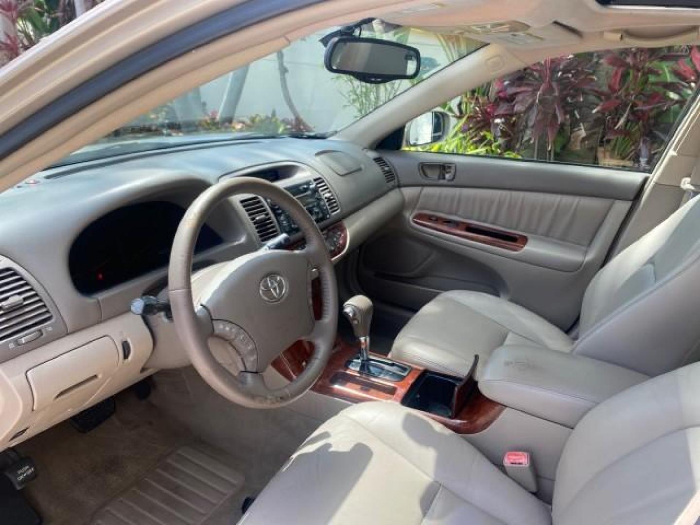 2005 Desert Sand Mica /Taupe Toyota Camry XLE V6 SUNROOF LEATHER (4T1BF30K35U) with an 3.0L DOHC MPFI Vvti 24-Valve V6 Engine engine, Automatic transmission, located at 4701 North Dixie Hwy, Pompano Beach, FL, 33064, (954) 422-2889, 26.240938, -80.123474 - OUR WEBPAGE FLORIDACARS1.COM HAS OVER 100 PHOTOS AND FREE CARFAX LINK 2005 TOYOTA CAMRY LE V6 SUNROOF LEATHER BUCKET SEATS VIN: 4T1BF30K35U597683 4 T 1 B F 3 0 K 3 5 U 5 9 7 6 8 3 SEDAN 4 DR 3.0L V6 F DOHC 24V GASOLINE 28 MPG FRONT WHEEL DRIVE TIRES ARE NEW ! Top Features Alloy Wheels Luxury Package - Photo#35