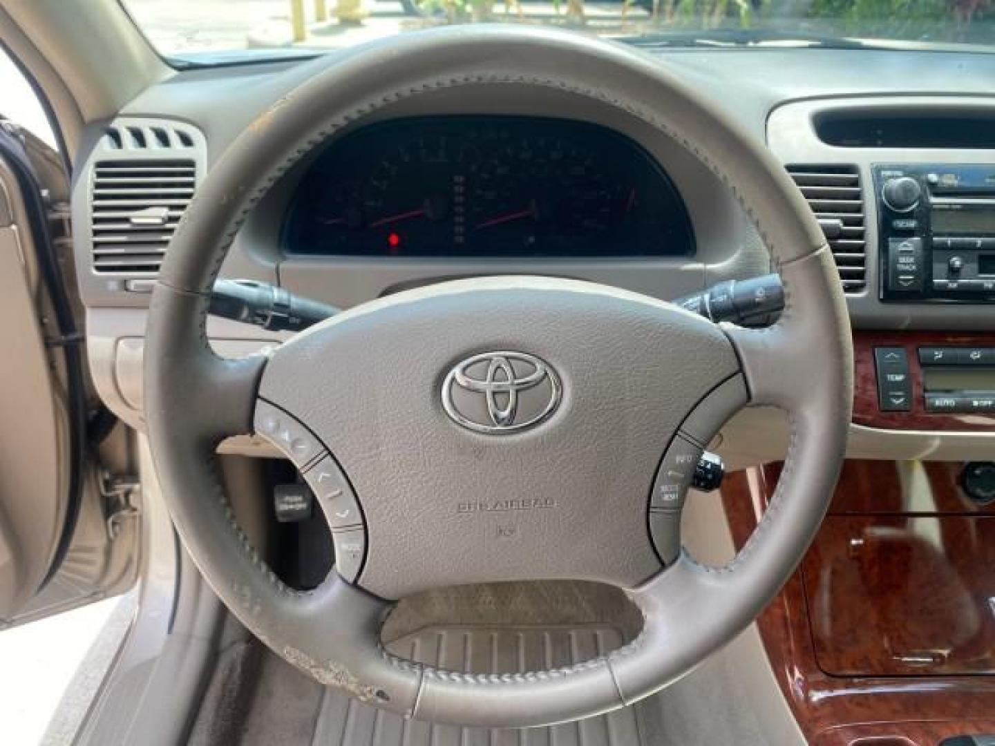 2005 Desert Sand Mica /Taupe Toyota Camry XLE V6 SUNROOF LEATHER (4T1BF30K35U) with an 3.0L DOHC MPFI Vvti 24-Valve V6 Engine engine, Automatic transmission, located at 4701 North Dixie Hwy, Pompano Beach, FL, 33064, (954) 422-2889, 26.240938, -80.123474 - OUR WEBPAGE FLORIDACARS1.COM HAS OVER 100 PHOTOS AND FREE CARFAX LINK 2005 TOYOTA CAMRY LE V6 SUNROOF LEATHER BUCKET SEATS VIN: 4T1BF30K35U597683 4 T 1 B F 3 0 K 3 5 U 5 9 7 6 8 3 SEDAN 4 DR 3.0L V6 F DOHC 24V GASOLINE 28 MPG FRONT WHEEL DRIVE TIRES ARE NEW ! Top Features Alloy Wheels Luxury Package - Photo#37