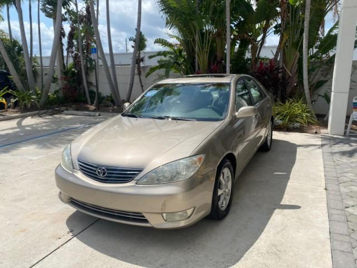 2005 Desert Sand Mica /Taupe Toyota Camry XLE V6 SUNROOF LEATHER (4T1BF30K35U) with an 3.0L DOHC MPFI Vvti 24-Valve V6 Engine engine, Automatic transmission, located at 4701 North Dixie Hwy, Pompano Beach, FL, 33064, (954) 422-2889, 26.240938, -80.123474 - OUR WEBPAGE FLORIDACARS1.COM HAS OVER 100 PHOTOS AND FREE CARFAX LINK 2005 TOYOTA CAMRY LE V6 SUNROOF LEATHER BUCKET SEATS VIN: 4T1BF30K35U597683 4 T 1 B F 3 0 K 3 5 U 5 9 7 6 8 3 SEDAN 4 DR 3.0L V6 F DOHC 24V GASOLINE 28 MPG FRONT WHEEL DRIVE TIRES ARE NEW ! Top Features Alloy Wheels Luxury Package - Photo#3