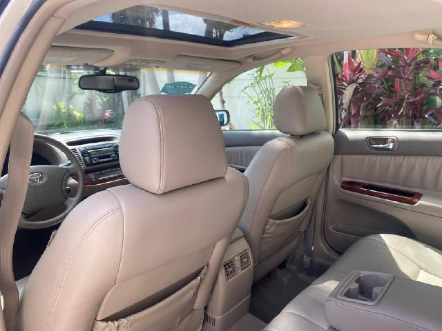 2005 Desert Sand Mica /Taupe Toyota Camry XLE V6 SUNROOF LEATHER (4T1BF30K35U) with an 3.0L DOHC MPFI Vvti 24-Valve V6 Engine engine, Automatic transmission, located at 4701 North Dixie Hwy, Pompano Beach, FL, 33064, (954) 422-2889, 26.240938, -80.123474 - OUR WEBPAGE FLORIDACARS1.COM HAS OVER 100 PHOTOS AND FREE CARFAX LINK 2005 TOYOTA CAMRY LE V6 SUNROOF LEATHER BUCKET SEATS VIN: 4T1BF30K35U597683 4 T 1 B F 3 0 K 3 5 U 5 9 7 6 8 3 SEDAN 4 DR 3.0L V6 F DOHC 24V GASOLINE 28 MPG FRONT WHEEL DRIVE TIRES ARE NEW ! Top Features Alloy Wheels Luxury Package - Photo#63