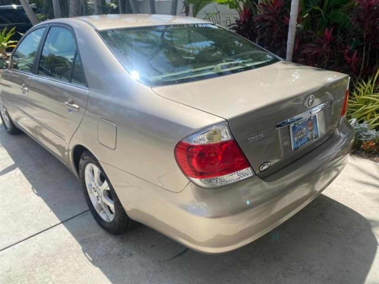 2005 Desert Sand Mica /Taupe Toyota Camry XLE V6 SUNROOF LEATHER (4T1BF30K35U) with an 3.0L DOHC MPFI Vvti 24-Valve V6 Engine engine, Automatic transmission, located at 4701 North Dixie Hwy, Pompano Beach, FL, 33064, (954) 422-2889, 26.240938, -80.123474 - OUR WEBPAGE FLORIDACARS1.COM HAS OVER 100 PHOTOS AND FREE CARFAX LINK 2005 TOYOTA CAMRY LE V6 SUNROOF LEATHER BUCKET SEATS VIN: 4T1BF30K35U597683 4 T 1 B F 3 0 K 3 5 U 5 9 7 6 8 3 SEDAN 4 DR 3.0L V6 F DOHC 24V GASOLINE 28 MPG FRONT WHEEL DRIVE TIRES ARE NEW ! Top Features Alloy Wheels Luxury Package - Photo#72