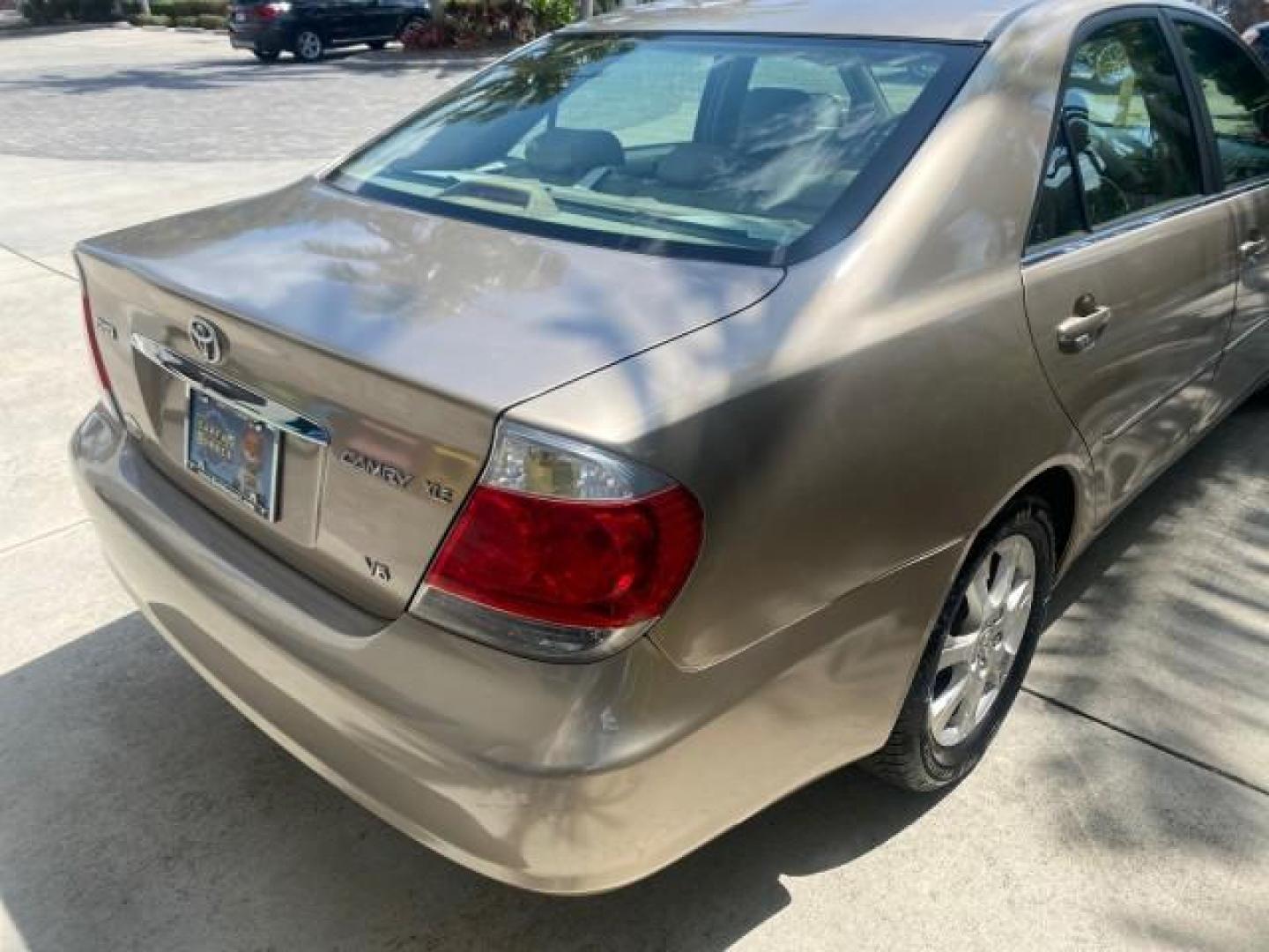 2005 Desert Sand Mica /Taupe Toyota Camry XLE V6 SUNROOF LEATHER (4T1BF30K35U) with an 3.0L DOHC MPFI Vvti 24-Valve V6 Engine engine, Automatic transmission, located at 4701 North Dixie Hwy, Pompano Beach, FL, 33064, (954) 422-2889, 26.240938, -80.123474 - OUR WEBPAGE FLORIDACARS1.COM HAS OVER 100 PHOTOS AND FREE CARFAX LINK 2005 TOYOTA CAMRY LE V6 SUNROOF LEATHER BUCKET SEATS VIN: 4T1BF30K35U597683 4 T 1 B F 3 0 K 3 5 U 5 9 7 6 8 3 SEDAN 4 DR 3.0L V6 F DOHC 24V GASOLINE 28 MPG FRONT WHEEL DRIVE TIRES ARE NEW ! Top Features Alloy Wheels Luxury Package - Photo#74