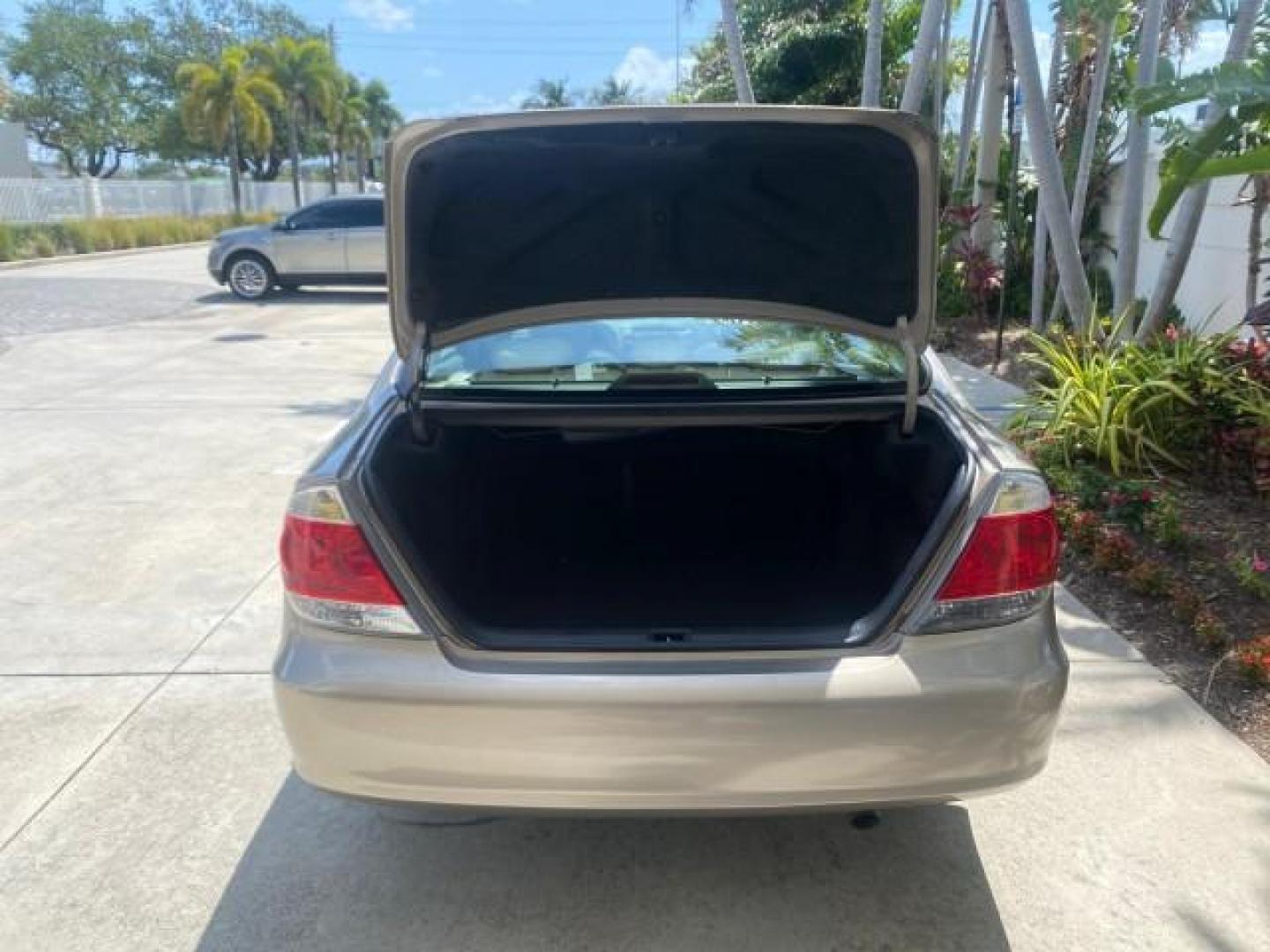 2005 Desert Sand Mica /Taupe Toyota Camry XLE V6 SUNROOF LEATHER (4T1BF30K35U) with an 3.0L DOHC MPFI Vvti 24-Valve V6 Engine engine, Automatic transmission, located at 4701 North Dixie Hwy, Pompano Beach, FL, 33064, (954) 422-2889, 26.240938, -80.123474 - OUR WEBPAGE FLORIDACARS1.COM HAS OVER 100 PHOTOS AND FREE CARFAX LINK 2005 TOYOTA CAMRY LE V6 SUNROOF LEATHER BUCKET SEATS VIN: 4T1BF30K35U597683 4 T 1 B F 3 0 K 3 5 U 5 9 7 6 8 3 SEDAN 4 DR 3.0L V6 F DOHC 24V GASOLINE 28 MPG FRONT WHEEL DRIVE TIRES ARE NEW ! Top Features Alloy Wheels Luxury Package - Photo#75