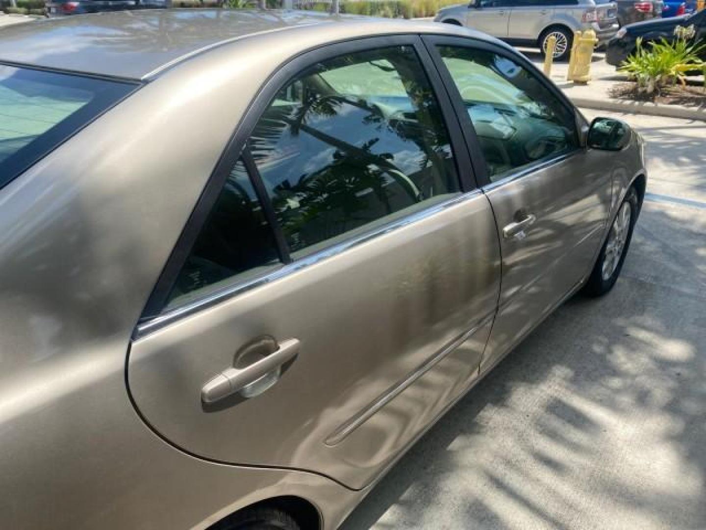 2005 Desert Sand Mica /Taupe Toyota Camry XLE V6 SUNROOF LEATHER (4T1BF30K35U) with an 3.0L DOHC MPFI Vvti 24-Valve V6 Engine engine, Automatic transmission, located at 4701 North Dixie Hwy, Pompano Beach, FL, 33064, (954) 422-2889, 26.240938, -80.123474 - OUR WEBPAGE FLORIDACARS1.COM HAS OVER 100 PHOTOS AND FREE CARFAX LINK 2005 TOYOTA CAMRY LE V6 SUNROOF LEATHER BUCKET SEATS VIN: 4T1BF30K35U597683 4 T 1 B F 3 0 K 3 5 U 5 9 7 6 8 3 SEDAN 4 DR 3.0L V6 F DOHC 24V GASOLINE 28 MPG FRONT WHEEL DRIVE TIRES ARE NEW ! Top Features Alloy Wheels Luxury Package - Photo#80
