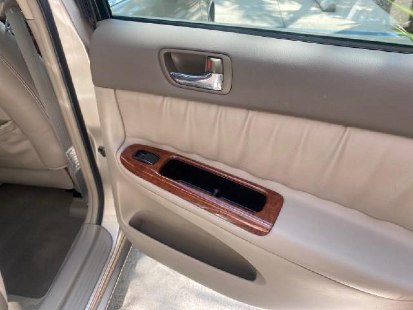 2005 Desert Sand Mica /Taupe Toyota Camry XLE V6 SUNROOF LEATHER (4T1BF30K35U) with an 3.0L DOHC MPFI Vvti 24-Valve V6 Engine engine, Automatic transmission, located at 4701 North Dixie Hwy, Pompano Beach, FL, 33064, (954) 422-2889, 26.240938, -80.123474 - OUR WEBPAGE FLORIDACARS1.COM HAS OVER 100 PHOTOS AND FREE CARFAX LINK 2005 TOYOTA CAMRY LE V6 SUNROOF LEATHER BUCKET SEATS VIN: 4T1BF30K35U597683 4 T 1 B F 3 0 K 3 5 U 5 9 7 6 8 3 SEDAN 4 DR 3.0L V6 F DOHC 24V GASOLINE 28 MPG FRONT WHEEL DRIVE TIRES ARE NEW ! Top Features Alloy Wheels Luxury Package - Photo#82