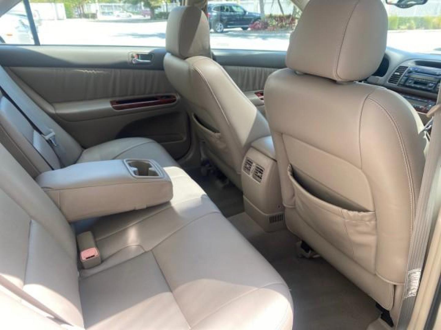 2005 Desert Sand Mica /Taupe Toyota Camry XLE V6 SUNROOF LEATHER (4T1BF30K35U) with an 3.0L DOHC MPFI Vvti 24-Valve V6 Engine engine, Automatic transmission, located at 4701 North Dixie Hwy, Pompano Beach, FL, 33064, (954) 422-2889, 26.240938, -80.123474 - OUR WEBPAGE FLORIDACARS1.COM HAS OVER 100 PHOTOS AND FREE CARFAX LINK 2005 TOYOTA CAMRY LE V6 SUNROOF LEATHER BUCKET SEATS VIN: 4T1BF30K35U597683 4 T 1 B F 3 0 K 3 5 U 5 9 7 6 8 3 SEDAN 4 DR 3.0L V6 F DOHC 24V GASOLINE 28 MPG FRONT WHEEL DRIVE TIRES ARE NEW ! Top Features Alloy Wheels Luxury Package - Photo#83