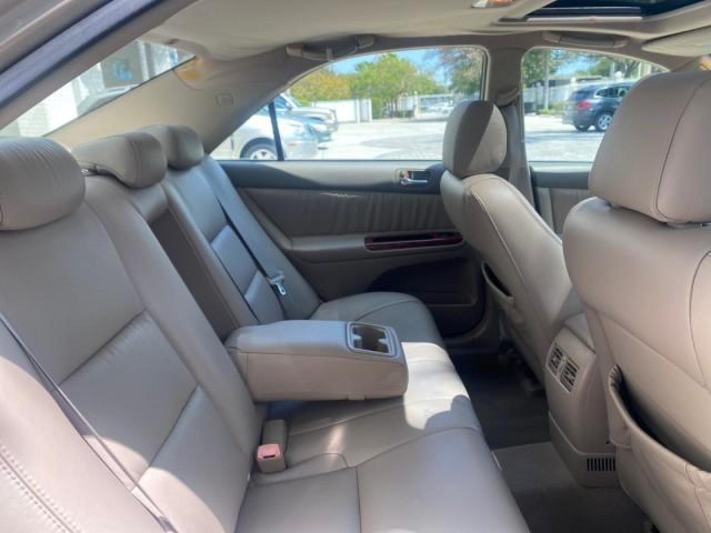 2005 Desert Sand Mica /Taupe Toyota Camry XLE V6 SUNROOF LEATHER (4T1BF30K35U) with an 3.0L DOHC MPFI Vvti 24-Valve V6 Engine engine, Automatic transmission, located at 4701 North Dixie Hwy, Pompano Beach, FL, 33064, (954) 422-2889, 26.240938, -80.123474 - OUR WEBPAGE FLORIDACARS1.COM HAS OVER 100 PHOTOS AND FREE CARFAX LINK 2005 TOYOTA CAMRY LE V6 SUNROOF LEATHER BUCKET SEATS VIN: 4T1BF30K35U597683 4 T 1 B F 3 0 K 3 5 U 5 9 7 6 8 3 SEDAN 4 DR 3.0L V6 F DOHC 24V GASOLINE 28 MPG FRONT WHEEL DRIVE TIRES ARE NEW ! Top Features Alloy Wheels Luxury Package - Photo#84