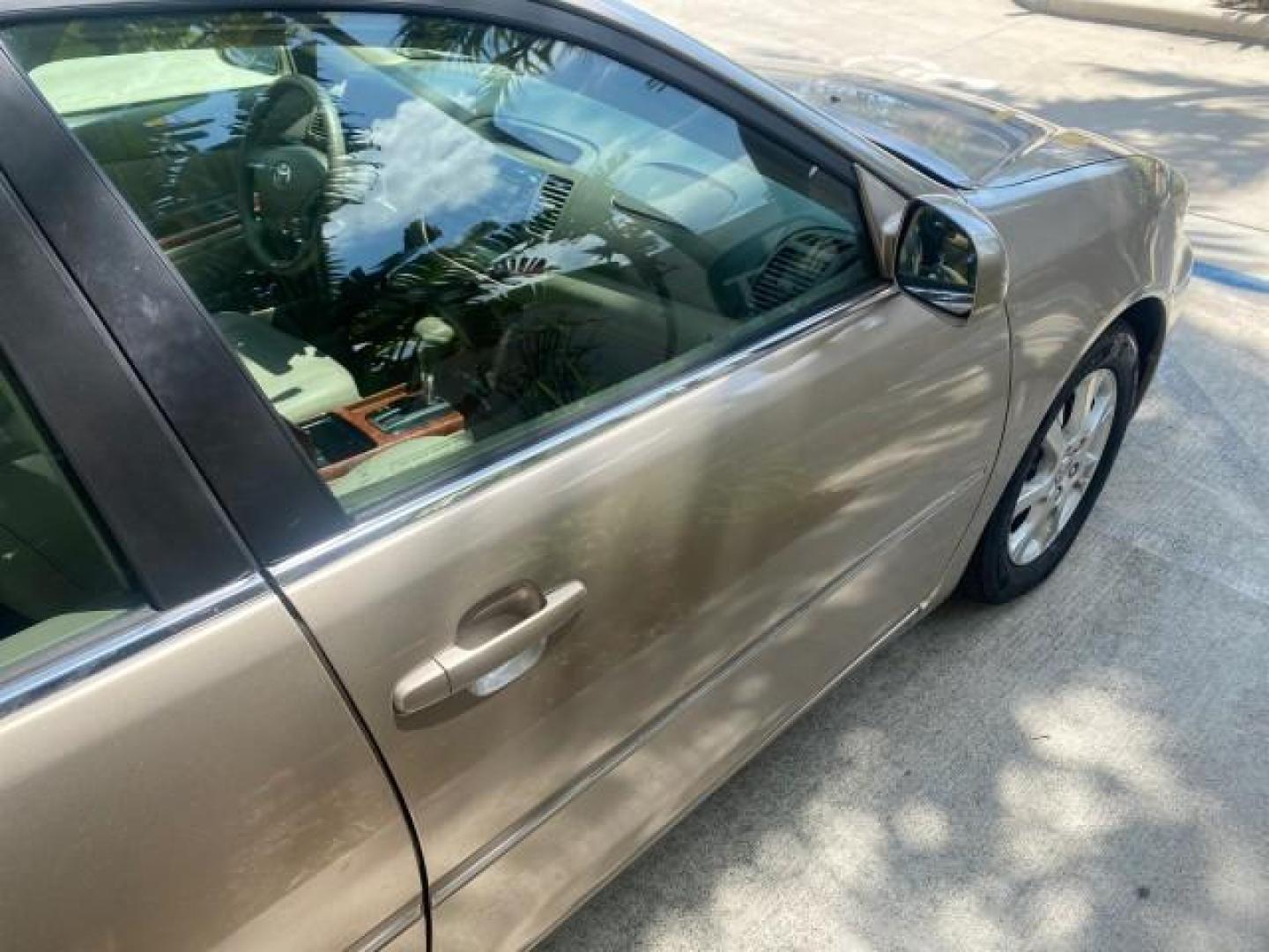 2005 Desert Sand Mica /Taupe Toyota Camry XLE V6 SUNROOF LEATHER (4T1BF30K35U) with an 3.0L DOHC MPFI Vvti 24-Valve V6 Engine engine, Automatic transmission, located at 4701 North Dixie Hwy, Pompano Beach, FL, 33064, (954) 422-2889, 26.240938, -80.123474 - OUR WEBPAGE FLORIDACARS1.COM HAS OVER 100 PHOTOS AND FREE CARFAX LINK 2005 TOYOTA CAMRY LE V6 SUNROOF LEATHER BUCKET SEATS VIN: 4T1BF30K35U597683 4 T 1 B F 3 0 K 3 5 U 5 9 7 6 8 3 SEDAN 4 DR 3.0L V6 F DOHC 24V GASOLINE 28 MPG FRONT WHEEL DRIVE TIRES ARE NEW ! Top Features Alloy Wheels Luxury Package - Photo#87