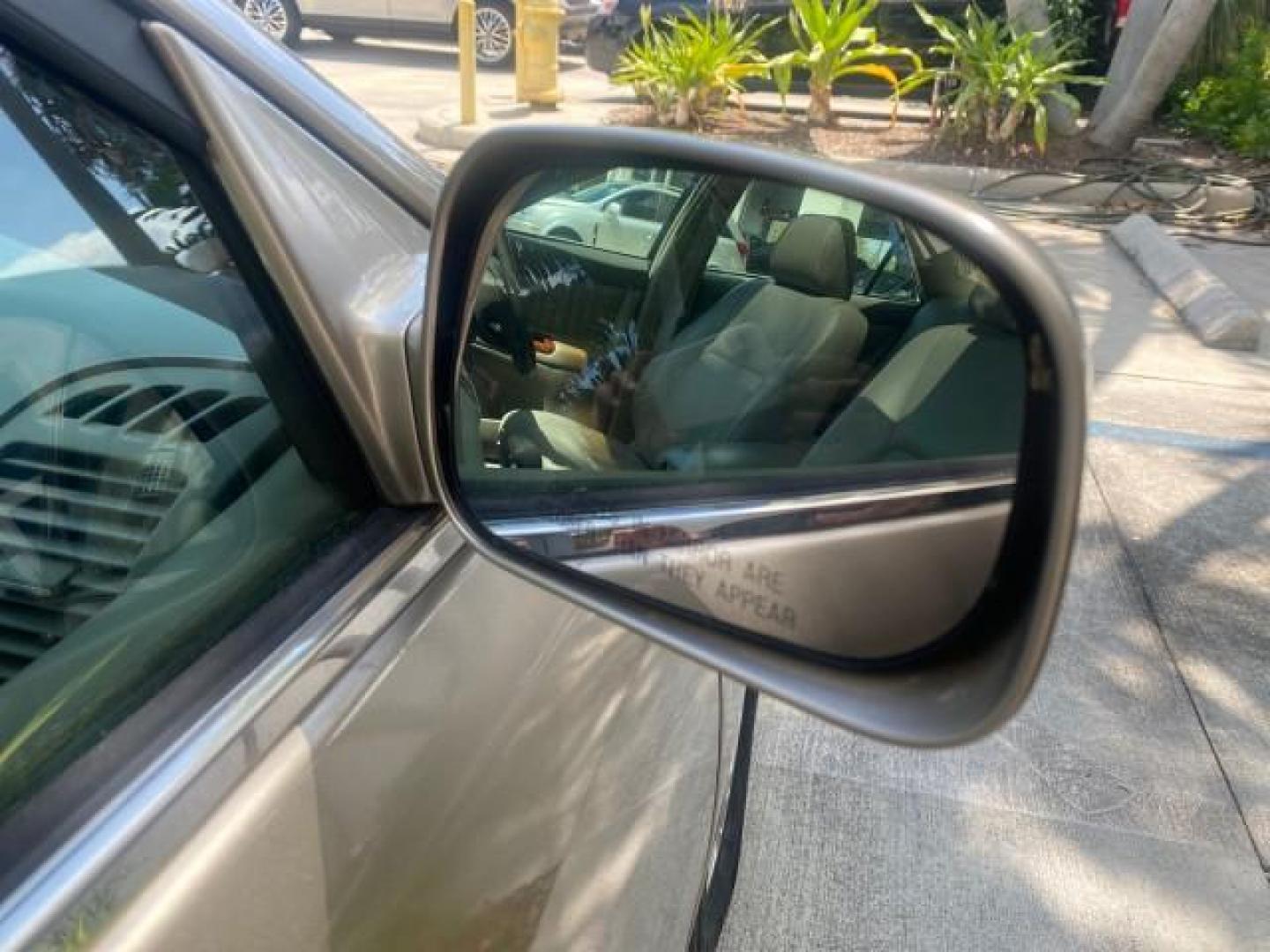 2005 Desert Sand Mica /Taupe Toyota Camry XLE V6 SUNROOF LEATHER (4T1BF30K35U) with an 3.0L DOHC MPFI Vvti 24-Valve V6 Engine engine, Automatic transmission, located at 4701 North Dixie Hwy, Pompano Beach, FL, 33064, (954) 422-2889, 26.240938, -80.123474 - OUR WEBPAGE FLORIDACARS1.COM HAS OVER 100 PHOTOS AND FREE CARFAX LINK 2005 TOYOTA CAMRY LE V6 SUNROOF LEATHER BUCKET SEATS VIN: 4T1BF30K35U597683 4 T 1 B F 3 0 K 3 5 U 5 9 7 6 8 3 SEDAN 4 DR 3.0L V6 F DOHC 24V GASOLINE 28 MPG FRONT WHEEL DRIVE TIRES ARE NEW ! Top Features Alloy Wheels Luxury Package - Photo#96