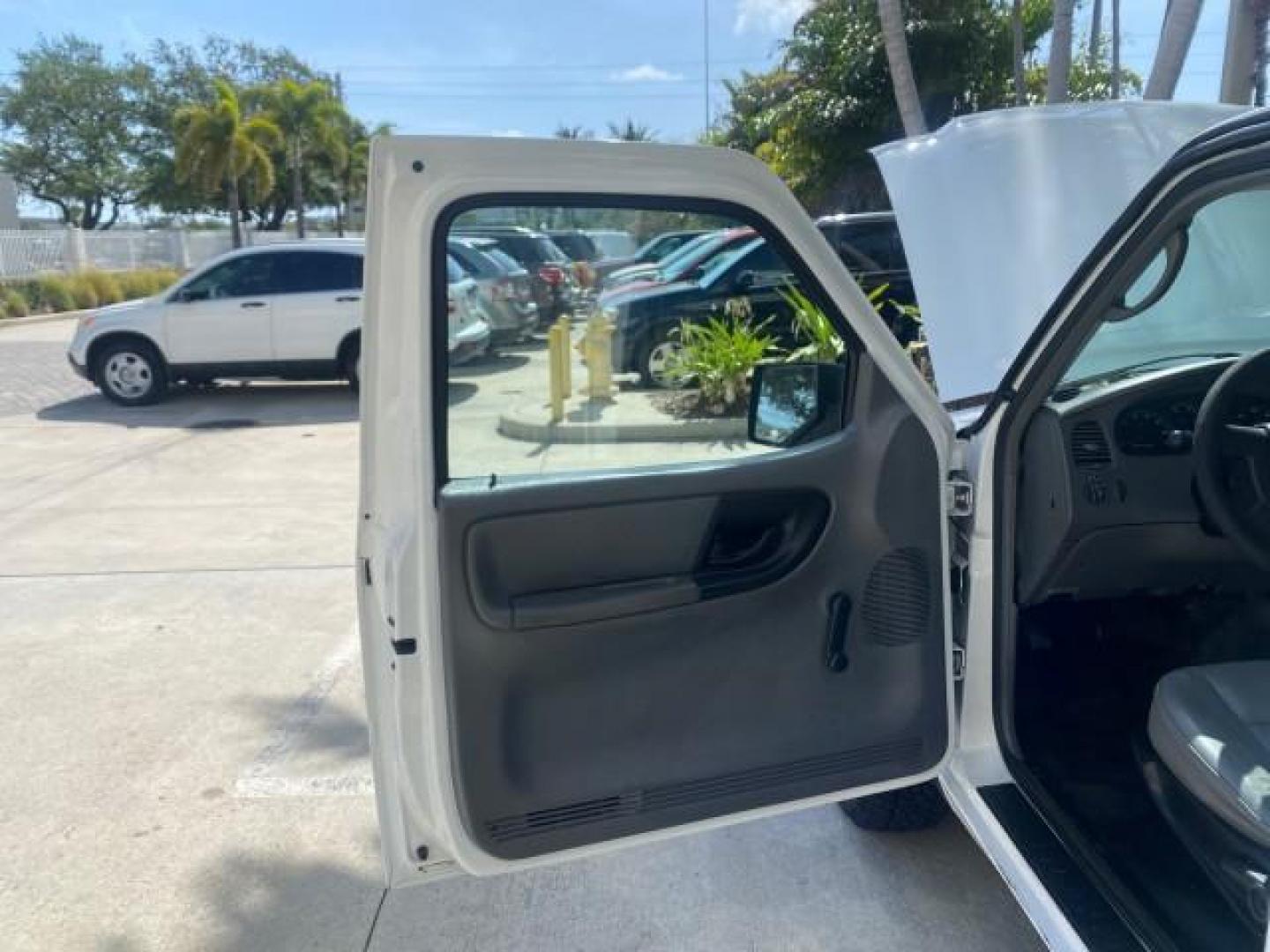 2006 Oxford White /Medium Dk Flint Ford Ranger XL 1 OWNER FLORIDA 4WD (1FTYR11U16P) with an 3.0L OHV V6 Engine engine, Automatic transmission, located at 4701 North Dixie Hwy, Pompano Beach, FL, 33064, (954) 422-2889, 26.240938, -80.123474 - OUR WEBPAGE FLORIDACARS1.COM HAS OVER 100 PHOTOS AND FREE CARFAX LINK 2006 FORD RANGER XL VIN: 1FTYR11U16PA54567 1 F T Y R 1 1 U 1 6 P A 5 4 5 6 7 PICKUP 3.0L V6 F GASOLINE REAR WHEEL DRIVE W/ 4X4 Top Features 4WD/AWD Bed Liner Alloy Wheels Basic Features ABS Brakes Air Conditioning CD Audio AM/FM S - Photo#9