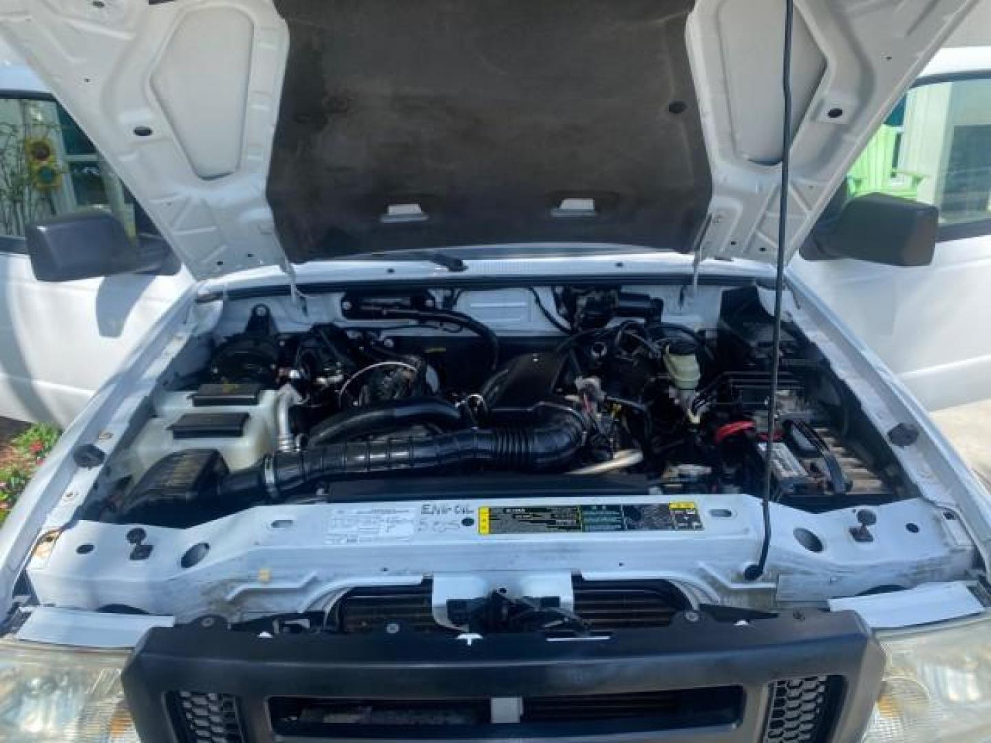 2006 Oxford White /Medium Dk Flint Ford Ranger XL 1 OWNER FLORIDA 4WD (1FTYR11U16P) with an 3.0L OHV V6 Engine engine, Automatic transmission, located at 4701 North Dixie Hwy, Pompano Beach, FL, 33064, (954) 422-2889, 26.240938, -80.123474 - OUR WEBPAGE FLORIDACARS1.COM HAS OVER 100 PHOTOS AND FREE CARFAX LINK 2006 FORD RANGER XL VIN: 1FTYR11U16PA54567 1 F T Y R 1 1 U 1 6 P A 5 4 5 6 7 PICKUP 3.0L V6 F GASOLINE REAR WHEEL DRIVE W/ 4X4 Top Features 4WD/AWD Bed Liner Alloy Wheels Basic Features ABS Brakes Air Conditioning CD Audio AM/FM S - Photo#17
