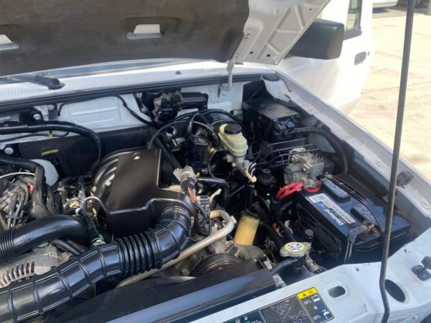 2006 Oxford White /Medium Dk Flint Ford Ranger XL 1 OWNER FLORIDA 4WD (1FTYR11U16P) with an 3.0L OHV V6 Engine engine, Automatic transmission, located at 4701 North Dixie Hwy, Pompano Beach, FL, 33064, (954) 422-2889, 26.240938, -80.123474 - OUR WEBPAGE FLORIDACARS1.COM HAS OVER 100 PHOTOS AND FREE CARFAX LINK 2006 FORD RANGER XL VIN: 1FTYR11U16PA54567 1 F T Y R 1 1 U 1 6 P A 5 4 5 6 7 PICKUP 3.0L V6 F GASOLINE REAR WHEEL DRIVE W/ 4X4 Top Features 4WD/AWD Bed Liner Alloy Wheels Basic Features ABS Brakes Air Conditioning CD Audio AM/FM S - Photo#25