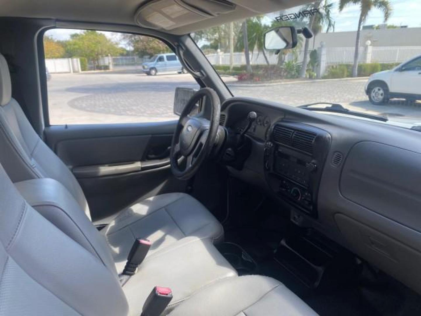 2006 Oxford White /Medium Dk Flint Ford Ranger XL 1 OWNER FLORIDA 4WD (1FTYR11U16P) with an 3.0L OHV V6 Engine engine, Automatic transmission, located at 4701 North Dixie Hwy, Pompano Beach, FL, 33064, (954) 422-2889, 26.240938, -80.123474 - OUR WEBPAGE FLORIDACARS1.COM HAS OVER 100 PHOTOS AND FREE CARFAX LINK 2006 FORD RANGER XL VIN: 1FTYR11U16PA54567 1 F T Y R 1 1 U 1 6 P A 5 4 5 6 7 PICKUP 3.0L V6 F GASOLINE REAR WHEEL DRIVE W/ 4X4 Top Features 4WD/AWD Bed Liner Alloy Wheels Basic Features ABS Brakes Air Conditioning CD Audio AM/FM S - Photo#98