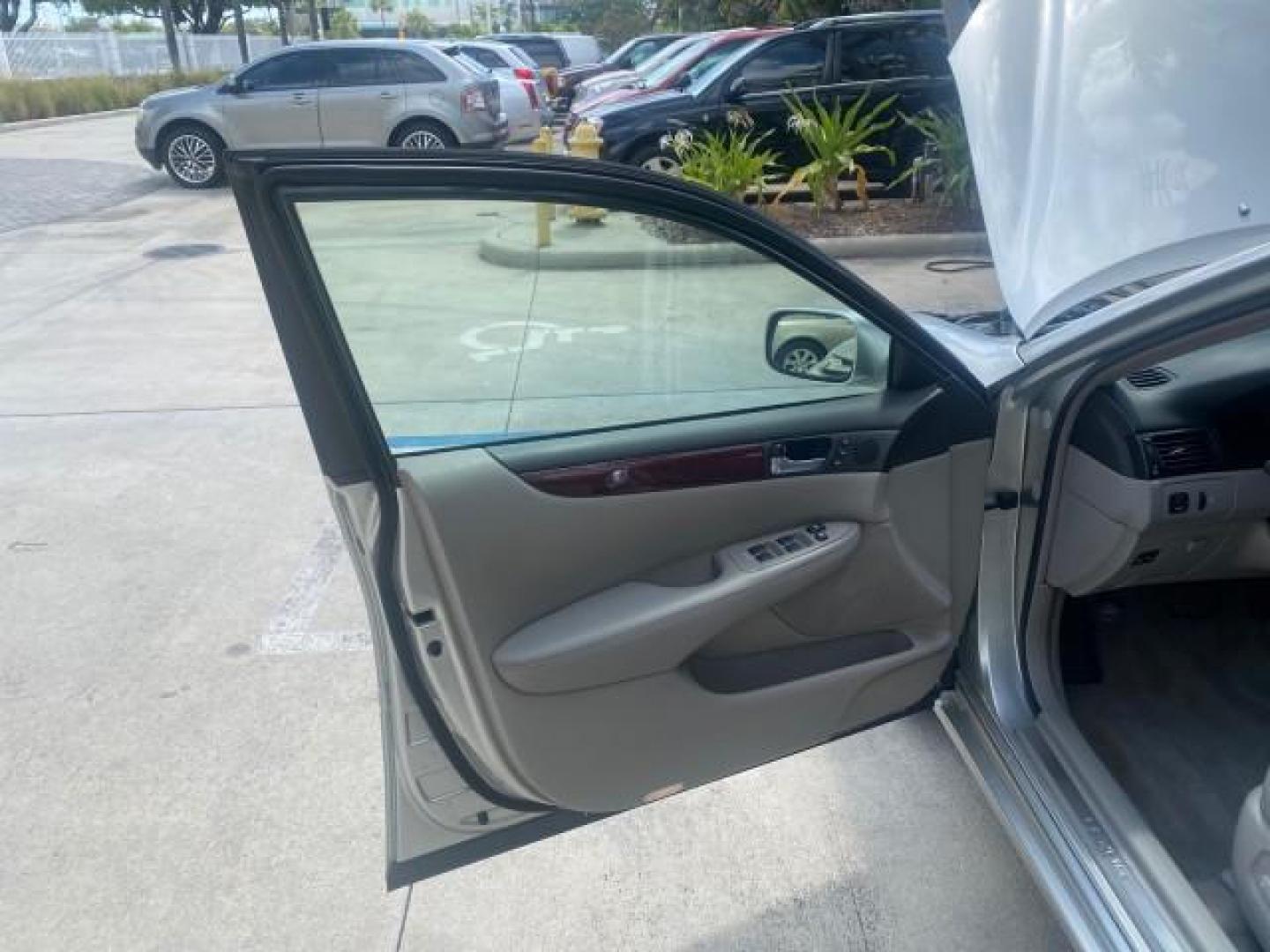 2004 Alabaster Metallic /Light Charcoal Lexus ES 330 1 OWNER FL LOW MILES 51,802 (JTHBA30G240) with an 3.3L DOHC EFI 24-Valve V6 Engine engine, Automatic transmission, located at 4701 North Dixie Hwy, Pompano Beach, FL, 33064, (954) 422-2889, 26.240938, -80.123474 - OUR WEBPAGE FLORIDACARS1.COM HAS OVER 100 PHOTOS AND FREE CARFAX LINK 2004 LEXUS ES 330 VIN: JTHBA30G240002762 J T H B A 3 0 G 2 4 0 0 0 2 7 6 2 SEDAN 4 DR 3.3L V6 F 24V GASOLINE 29 MPG FRONT WHEEL DRIVE Top Features Alloy Wheels Leather Seats Memory Seat(s) Sunroof(s) Basic Features ABS Brakes CD A - Photo#9