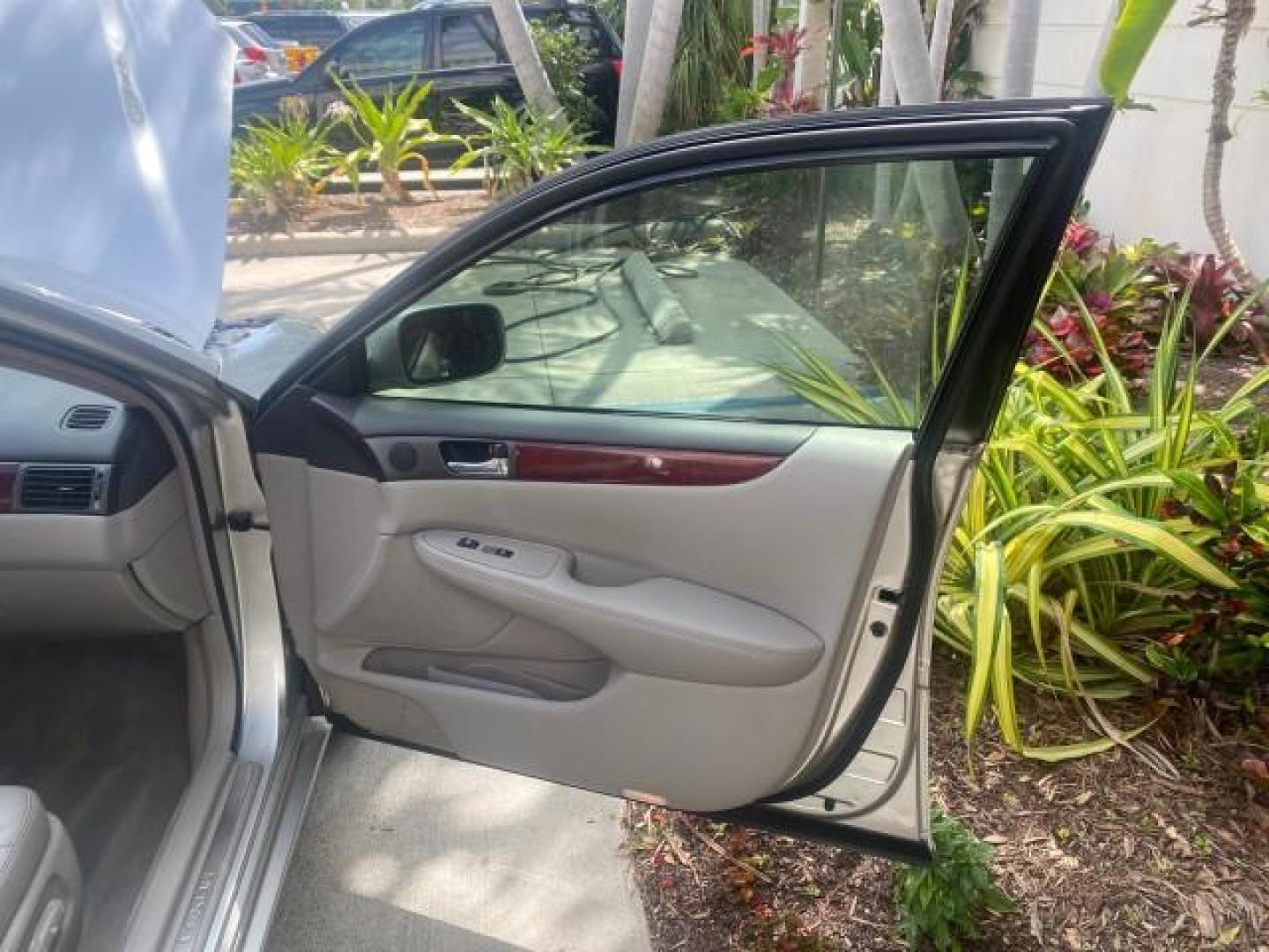 2004 Alabaster Metallic /Light Charcoal Lexus ES 330 1 OWNER FL LOW MILES 51,802 (JTHBA30G240) with an 3.3L DOHC EFI 24-Valve V6 Engine engine, Automatic transmission, located at 4701 North Dixie Hwy, Pompano Beach, FL, 33064, (954) 422-2889, 26.240938, -80.123474 - OUR WEBPAGE FLORIDACARS1.COM HAS OVER 100 PHOTOS AND FREE CARFAX LINK 2004 LEXUS ES 330 VIN: JTHBA30G240002762 J T H B A 3 0 G 2 4 0 0 0 2 7 6 2 SEDAN 4 DR 3.3L V6 F 24V GASOLINE 29 MPG FRONT WHEEL DRIVE Top Features Alloy Wheels Leather Seats Memory Seat(s) Sunroof(s) Basic Features ABS Brakes CD A - Photo#11