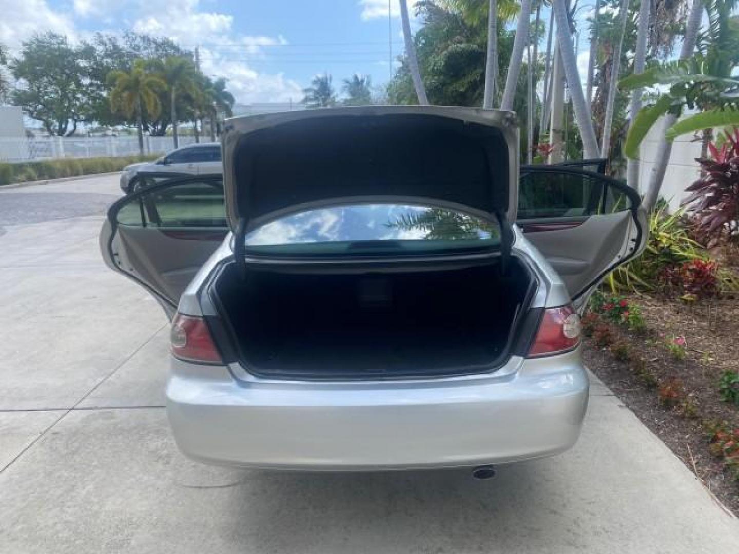 2004 Alabaster Metallic /Light Charcoal Lexus ES 330 1 OWNER FL LOW MILES 51,802 (JTHBA30G240) with an 3.3L DOHC EFI 24-Valve V6 Engine engine, Automatic transmission, located at 4701 North Dixie Hwy, Pompano Beach, FL, 33064, (954) 422-2889, 26.240938, -80.123474 - OUR WEBPAGE FLORIDACARS1.COM HAS OVER 100 PHOTOS AND FREE CARFAX LINK 2004 LEXUS ES 330 VIN: JTHBA30G240002762 J T H B A 3 0 G 2 4 0 0 0 2 7 6 2 SEDAN 4 DR 3.3L V6 F 24V GASOLINE 29 MPG FRONT WHEEL DRIVE Top Features Alloy Wheels Leather Seats Memory Seat(s) Sunroof(s) Basic Features ABS Brakes CD A - Photo#15