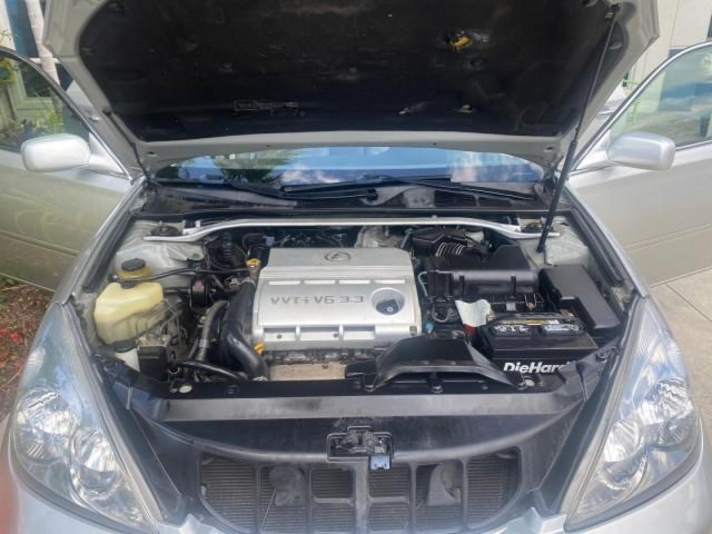 2004 Alabaster Metallic /Light Charcoal Lexus ES 330 1 OWNER FL LOW MILES 51,802 (JTHBA30G240) with an 3.3L DOHC EFI 24-Valve V6 Engine engine, Automatic transmission, located at 4701 North Dixie Hwy, Pompano Beach, FL, 33064, (954) 422-2889, 26.240938, -80.123474 - OUR WEBPAGE FLORIDACARS1.COM HAS OVER 100 PHOTOS AND FREE CARFAX LINK 2004 LEXUS ES 330 VIN: JTHBA30G240002762 J T H B A 3 0 G 2 4 0 0 0 2 7 6 2 SEDAN 4 DR 3.3L V6 F 24V GASOLINE 29 MPG FRONT WHEEL DRIVE Top Features Alloy Wheels Leather Seats Memory Seat(s) Sunroof(s) Basic Features ABS Brakes CD A - Photo#17