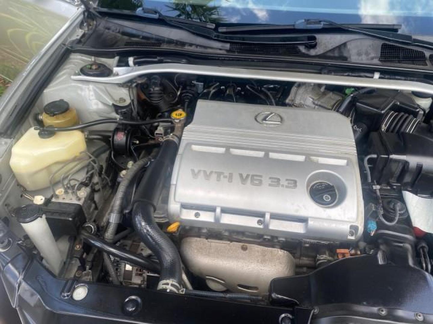 2004 Alabaster Metallic /Light Charcoal Lexus ES 330 1 OWNER FL LOW MILES 51,802 (JTHBA30G240) with an 3.3L DOHC EFI 24-Valve V6 Engine engine, Automatic transmission, located at 4701 North Dixie Hwy, Pompano Beach, FL, 33064, (954) 422-2889, 26.240938, -80.123474 - OUR WEBPAGE FLORIDACARS1.COM HAS OVER 100 PHOTOS AND FREE CARFAX LINK 2004 LEXUS ES 330 VIN: JTHBA30G240002762 J T H B A 3 0 G 2 4 0 0 0 2 7 6 2 SEDAN 4 DR 3.3L V6 F 24V GASOLINE 29 MPG FRONT WHEEL DRIVE Top Features Alloy Wheels Leather Seats Memory Seat(s) Sunroof(s) Basic Features ABS Brakes CD A - Photo#24