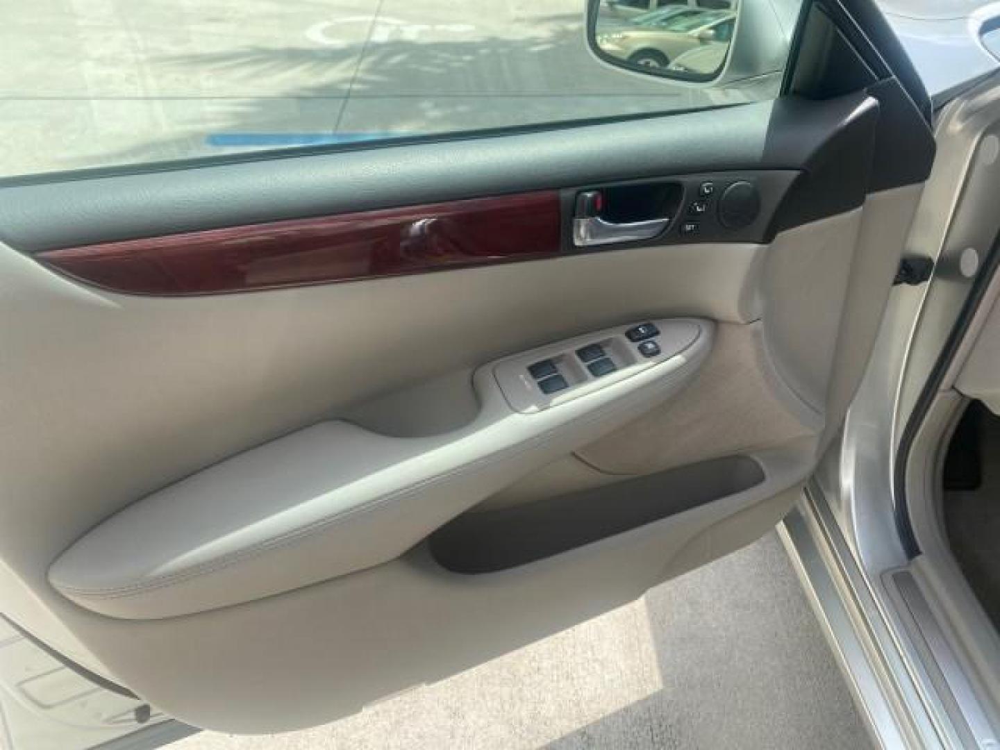 2004 Alabaster Metallic /Light Charcoal Lexus ES 330 1 OWNER FL LOW MILES 51,802 (JTHBA30G240) with an 3.3L DOHC EFI 24-Valve V6 Engine engine, Automatic transmission, located at 4701 North Dixie Hwy, Pompano Beach, FL, 33064, (954) 422-2889, 26.240938, -80.123474 - OUR WEBPAGE FLORIDACARS1.COM HAS OVER 100 PHOTOS AND FREE CARFAX LINK 2004 LEXUS ES 330 VIN: JTHBA30G240002762 J T H B A 3 0 G 2 4 0 0 0 2 7 6 2 SEDAN 4 DR 3.3L V6 F 24V GASOLINE 29 MPG FRONT WHEEL DRIVE Top Features Alloy Wheels Leather Seats Memory Seat(s) Sunroof(s) Basic Features ABS Brakes CD A - Photo#30