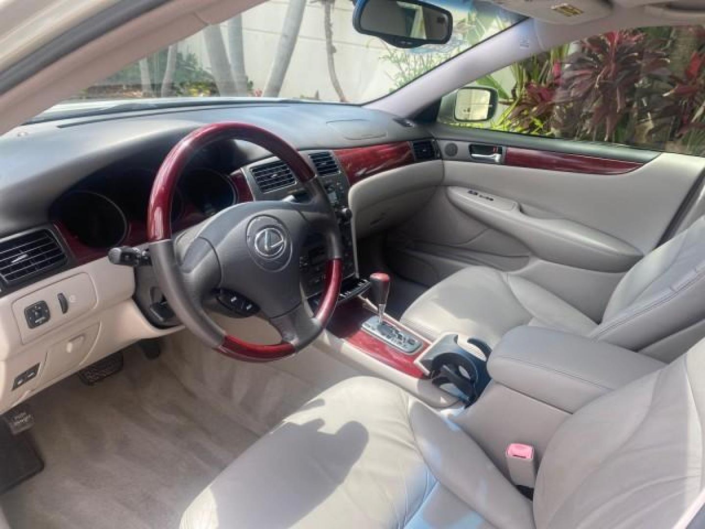 2004 Alabaster Metallic /Light Charcoal Lexus ES 330 1 OWNER FL LOW MILES 51,802 (JTHBA30G240) with an 3.3L DOHC EFI 24-Valve V6 Engine engine, Automatic transmission, located at 4701 North Dixie Hwy, Pompano Beach, FL, 33064, (954) 422-2889, 26.240938, -80.123474 - OUR WEBPAGE FLORIDACARS1.COM HAS OVER 100 PHOTOS AND FREE CARFAX LINK 2004 LEXUS ES 330 VIN: JTHBA30G240002762 J T H B A 3 0 G 2 4 0 0 0 2 7 6 2 SEDAN 4 DR 3.3L V6 F 24V GASOLINE 29 MPG FRONT WHEEL DRIVE Top Features Alloy Wheels Leather Seats Memory Seat(s) Sunroof(s) Basic Features ABS Brakes CD A - Photo#33