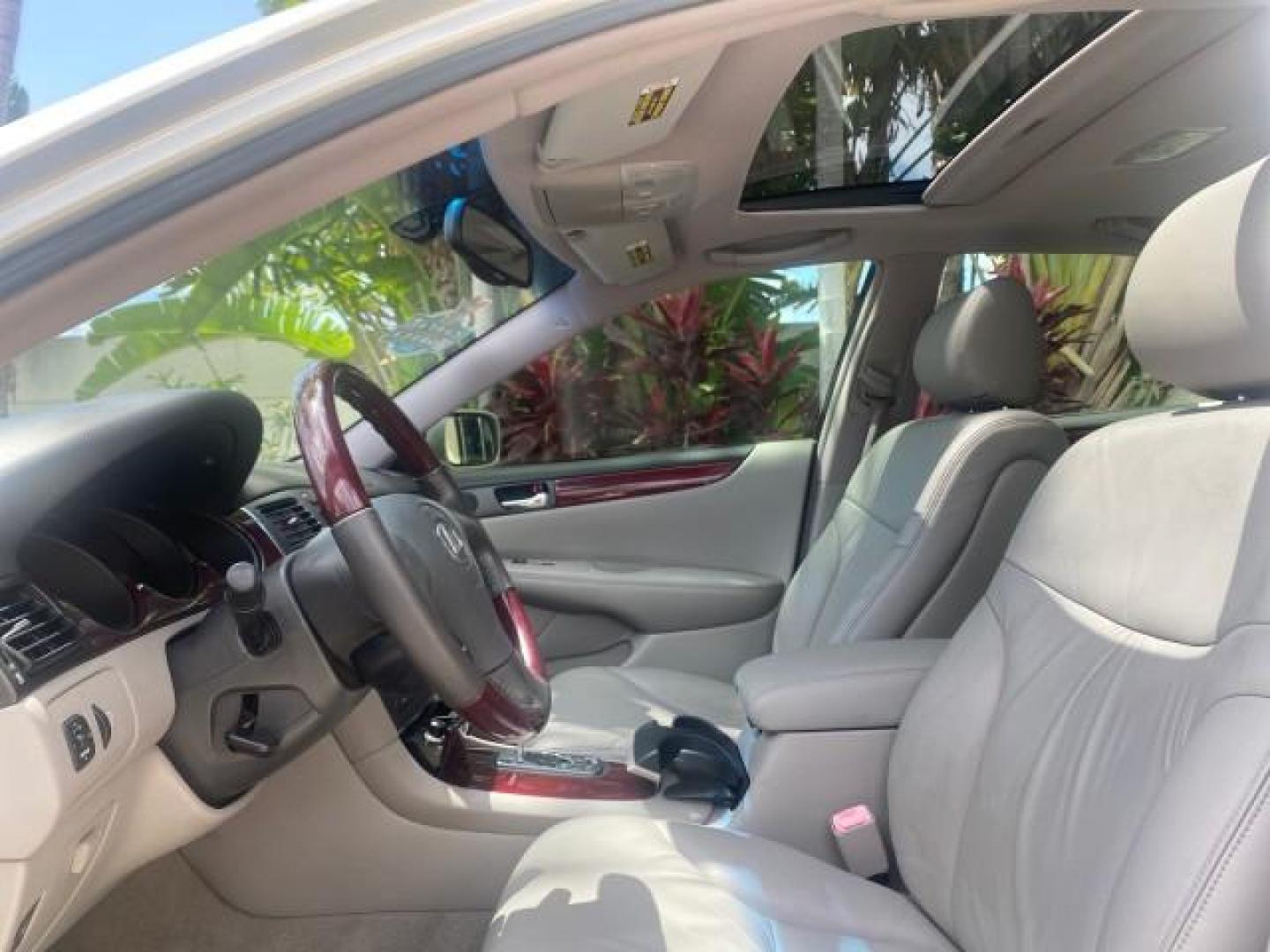 2004 Alabaster Metallic /Light Charcoal Lexus ES 330 1 OWNER FL LOW MILES 51,802 (JTHBA30G240) with an 3.3L DOHC EFI 24-Valve V6 Engine engine, Automatic transmission, located at 4701 North Dixie Hwy, Pompano Beach, FL, 33064, (954) 422-2889, 26.240938, -80.123474 - OUR WEBPAGE FLORIDACARS1.COM HAS OVER 100 PHOTOS AND FREE CARFAX LINK 2004 LEXUS ES 330 VIN: JTHBA30G240002762 J T H B A 3 0 G 2 4 0 0 0 2 7 6 2 SEDAN 4 DR 3.3L V6 F 24V GASOLINE 29 MPG FRONT WHEEL DRIVE Top Features Alloy Wheels Leather Seats Memory Seat(s) Sunroof(s) Basic Features ABS Brakes CD A - Photo#35