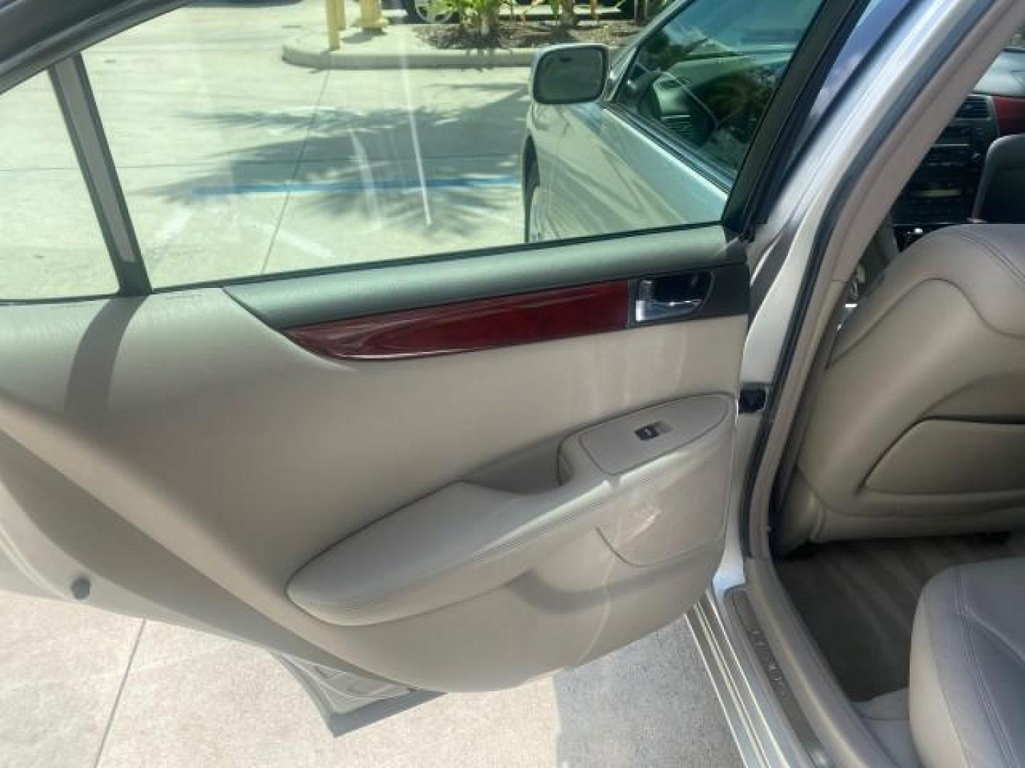 2004 Alabaster Metallic /Light Charcoal Lexus ES 330 1 OWNER FL LOW MILES 51,802 (JTHBA30G240) with an 3.3L DOHC EFI 24-Valve V6 Engine engine, Automatic transmission, located at 4701 North Dixie Hwy, Pompano Beach, FL, 33064, (954) 422-2889, 26.240938, -80.123474 - OUR WEBPAGE FLORIDACARS1.COM HAS OVER 100 PHOTOS AND FREE CARFAX LINK 2004 LEXUS ES 330 VIN: JTHBA30G240002762 J T H B A 3 0 G 2 4 0 0 0 2 7 6 2 SEDAN 4 DR 3.3L V6 F 24V GASOLINE 29 MPG FRONT WHEEL DRIVE Top Features Alloy Wheels Leather Seats Memory Seat(s) Sunroof(s) Basic Features ABS Brakes CD A - Photo#61