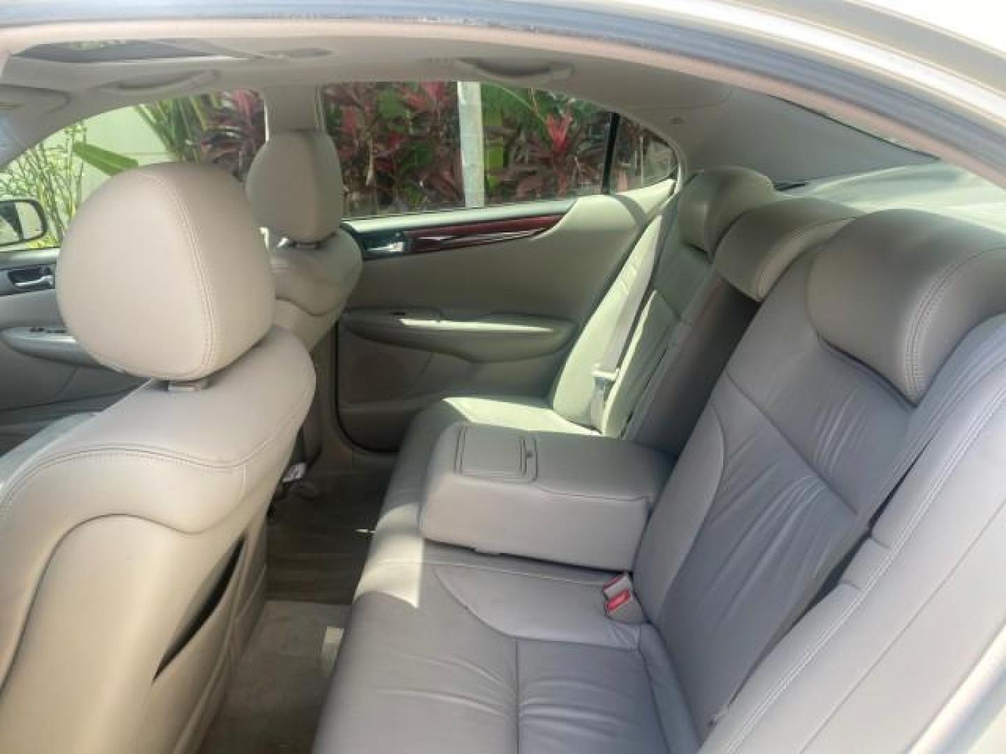 2004 Alabaster Metallic /Light Charcoal Lexus ES 330 1 OWNER FL LOW MILES 51,802 (JTHBA30G240) with an 3.3L DOHC EFI 24-Valve V6 Engine engine, Automatic transmission, located at 4701 North Dixie Hwy, Pompano Beach, FL, 33064, (954) 422-2889, 26.240938, -80.123474 - OUR WEBPAGE FLORIDACARS1.COM HAS OVER 100 PHOTOS AND FREE CARFAX LINK 2004 LEXUS ES 330 VIN: JTHBA30G240002762 J T H B A 3 0 G 2 4 0 0 0 2 7 6 2 SEDAN 4 DR 3.3L V6 F 24V GASOLINE 29 MPG FRONT WHEEL DRIVE Top Features Alloy Wheels Leather Seats Memory Seat(s) Sunroof(s) Basic Features ABS Brakes CD A - Photo#64