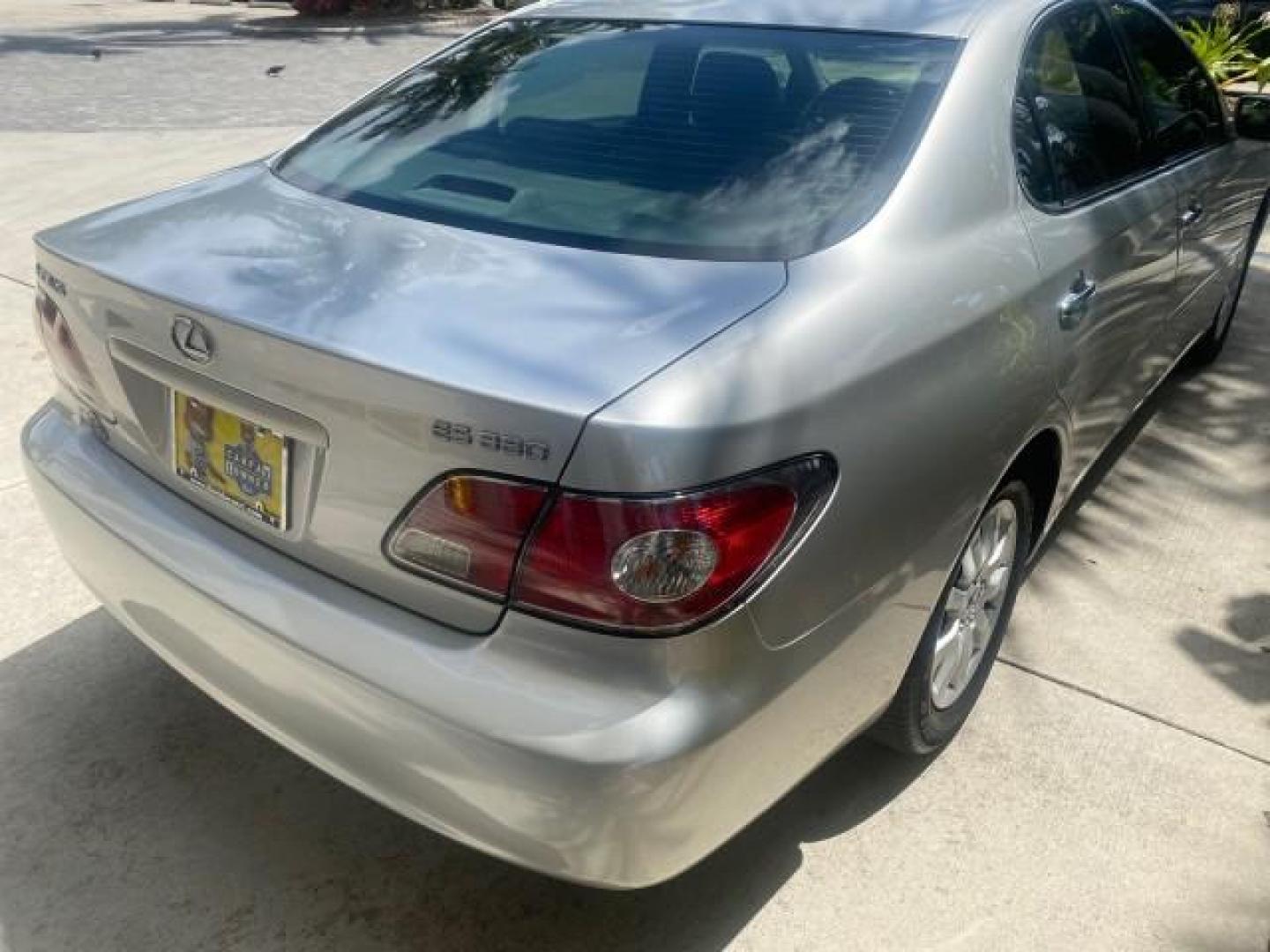 2004 Alabaster Metallic /Light Charcoal Lexus ES 330 1 OWNER FL LOW MILES 51,802 (JTHBA30G240) with an 3.3L DOHC EFI 24-Valve V6 Engine engine, Automatic transmission, located at 4701 North Dixie Hwy, Pompano Beach, FL, 33064, (954) 422-2889, 26.240938, -80.123474 - OUR WEBPAGE FLORIDACARS1.COM HAS OVER 100 PHOTOS AND FREE CARFAX LINK 2004 LEXUS ES 330 VIN: JTHBA30G240002762 J T H B A 3 0 G 2 4 0 0 0 2 7 6 2 SEDAN 4 DR 3.3L V6 F 24V GASOLINE 29 MPG FRONT WHEEL DRIVE Top Features Alloy Wheels Leather Seats Memory Seat(s) Sunroof(s) Basic Features ABS Brakes CD A - Photo#73