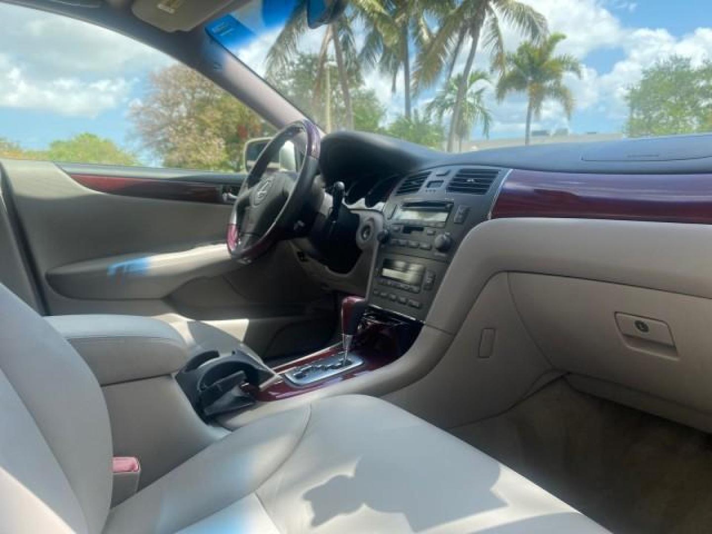 2004 Alabaster Metallic /Light Charcoal Lexus ES 330 1 OWNER FL LOW MILES 51,802 (JTHBA30G240) with an 3.3L DOHC EFI 24-Valve V6 Engine engine, Automatic transmission, located at 4701 North Dixie Hwy, Pompano Beach, FL, 33064, (954) 422-2889, 26.240938, -80.123474 - OUR WEBPAGE FLORIDACARS1.COM HAS OVER 100 PHOTOS AND FREE CARFAX LINK 2004 LEXUS ES 330 VIN: JTHBA30G240002762 J T H B A 3 0 G 2 4 0 0 0 2 7 6 2 SEDAN 4 DR 3.3L V6 F 24V GASOLINE 29 MPG FRONT WHEEL DRIVE Top Features Alloy Wheels Leather Seats Memory Seat(s) Sunroof(s) Basic Features ABS Brakes CD A - Photo#91