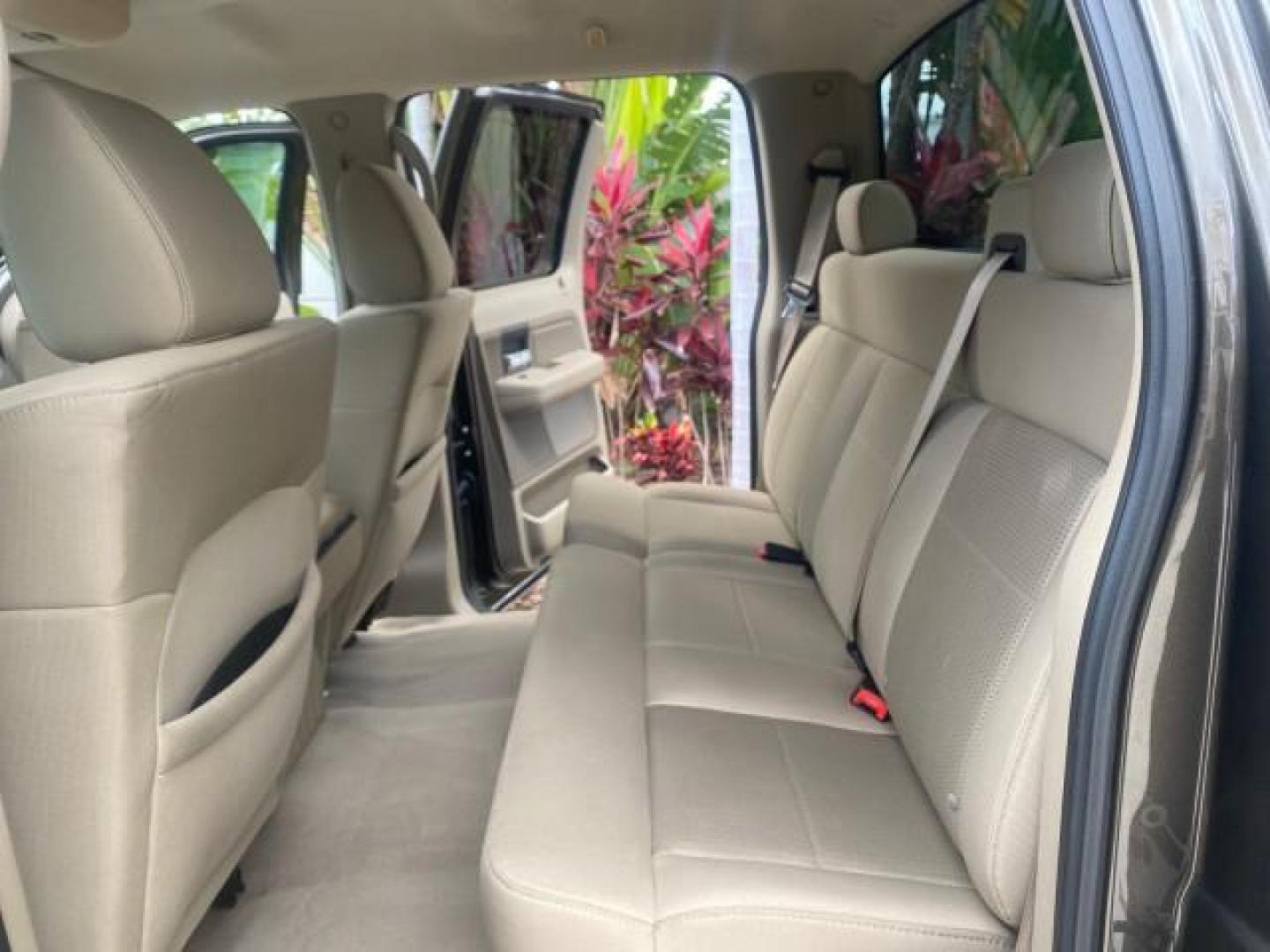 2008 Stone Green Metallic /Tan Ford F-150 XLT CREW CAB 1 OWNER LOW MILES (1FTRW12W98F) with an 4.6L EFI V8 Engine engine, Automatic transmission, located at 4701 North Dixie Hwy, Pompano Beach, FL, 33064, (954) 422-2889, 26.240938, -80.123474 - OUR WEBPAGE FLORIDACARS1.COM HAS OVER 100 PHOTOS AND FREE CARFAX LINK 2008 FORD F-150 XLT VIN: 1FTRW12W98FB00300 1 F T R W 1 2 W 9 8 F B 0 0 3 0 0 CREW PICKUP 4.6L V8 F SOHC GASOLINE REAR WHEEL DRIVE Top Features 20 Inch Plus Wheels Running Boards Alloy Wheels Sport Package Bed Liner Tow Hitch Cloth - Photo#14
