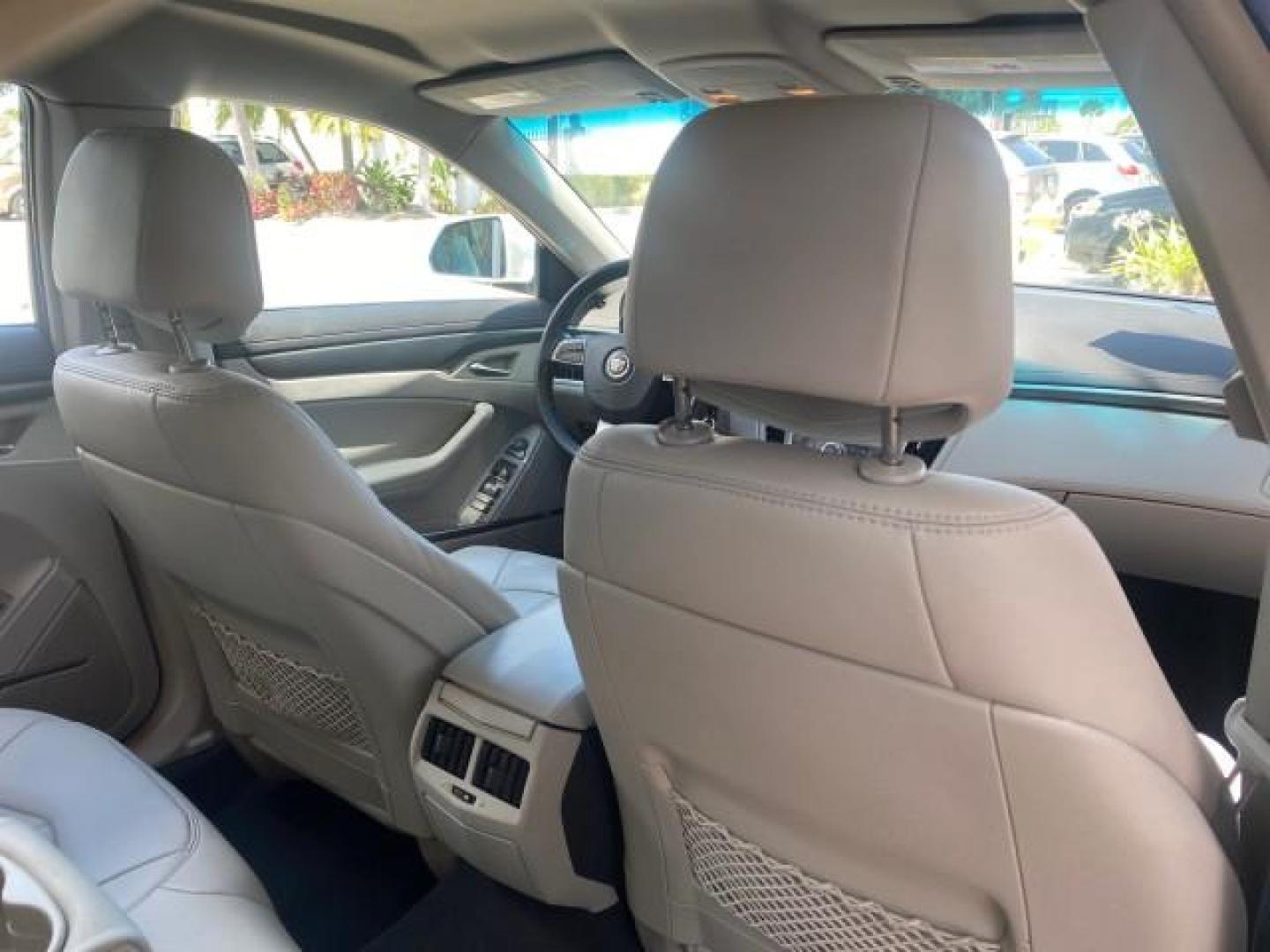 2010 Radiant Silver /Light Titanium/Ebony Cadillac CTS Sedan FLORIDA LOW MILES 50,874 (1G6DA5EG3A0) with an 3.0L V6 SIDI DOHC VVT Engine engine, Automatic transmission, located at 4701 North Dixie Hwy, Pompano Beach, FL, 33064, (954) 422-2889, 26.240938, -80.123474 - OUR WEBPAGE FLORIDACARS1.COM HAS OVER 100 PHOTOS AND FREE CARFAX LINK 2010 CADILLAC CTS 3.0L V6 VIN: 1G6DA5EG3A0134555 1 G 6 D A 5 E G 3 A 0 1 3 4 5 5 5 SEDAN 4 DR 3.0L V6 F DOHC 24V GASOLINE REAR WHEEL DRIVE Top Features Alloy Wheels Basic Features ABS Brakes Overhead Airbags Power Windows Smart Ke - Photo#82