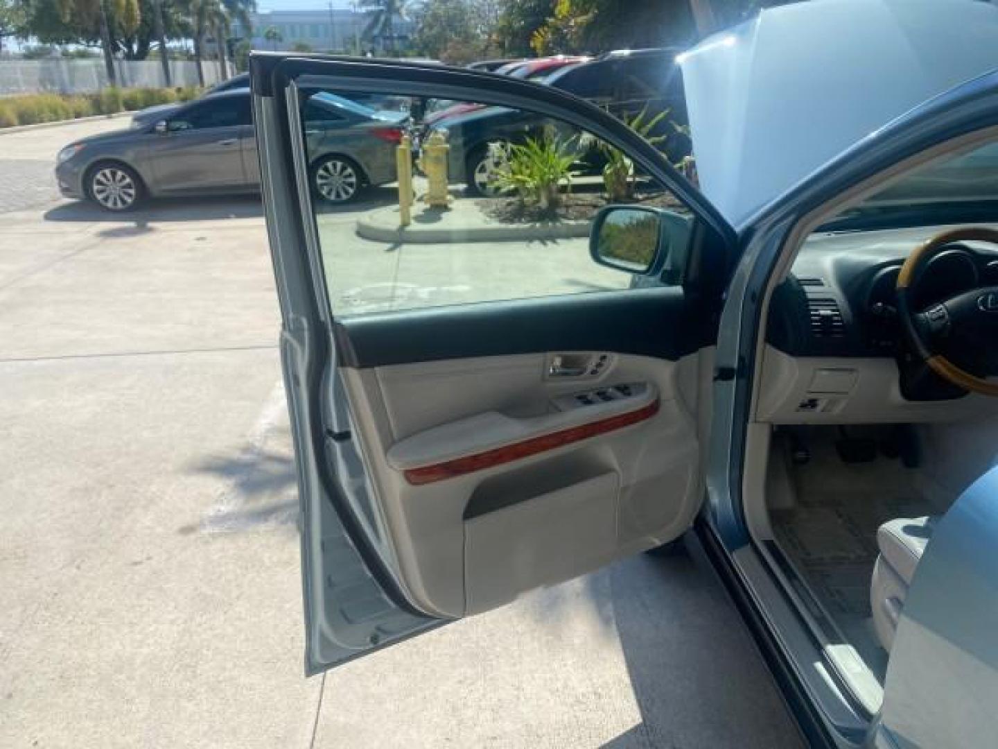 2004 Breakwater Blue Metallic /Light Gray Lexus RX 330 Leather Sunroof CD Cruise Alloy Wheels (2T2GA31U74C) with an 3.3L DOHC MPI 24-Valve V6 Engine engine, Automatic transmission, located at 4701 North Dixie Hwy, Pompano Beach, FL, 33064, (954) 422-2889, 26.240938, -80.123474 - OUR WEBPAGE FLORIDACARS1.COM HAS OVER 100 PHOTOS AND FREE CARFAX LINK 2004 LEXUS RX 330 VIN: 2T2GA31U74C017089 2 T 2 G A 3 1 U 7 4 C 0 1 7 0 8 9 4 DOOR WAGON/SPORT UTILITY 3.3L V6 F 24V GASOLINE FRONT WHEEL DRIVE Highlighted Features Power Sunroof Power Windows Leather Seats 6 Disc CD Changer Alloy - Photo#9