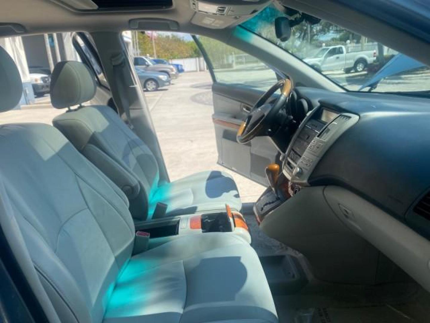 2004 Breakwater Blue Metallic /Light Gray Lexus RX 330 Leather Sunroof CD Cruise Alloy Wheels (2T2GA31U74C) with an 3.3L DOHC MPI 24-Valve V6 Engine engine, Automatic transmission, located at 4701 North Dixie Hwy, Pompano Beach, FL, 33064, (954) 422-2889, 26.240938, -80.123474 - OUR WEBPAGE FLORIDACARS1.COM HAS OVER 100 PHOTOS AND FREE CARFAX LINK 2004 LEXUS RX 330 VIN: 2T2GA31U74C017089 2 T 2 G A 3 1 U 7 4 C 0 1 7 0 8 9 4 DOOR WAGON/SPORT UTILITY 3.3L V6 F 24V GASOLINE FRONT WHEEL DRIVE Highlighted Features Power Sunroof Power Windows Leather Seats 6 Disc CD Changer Alloy - Photo#12
