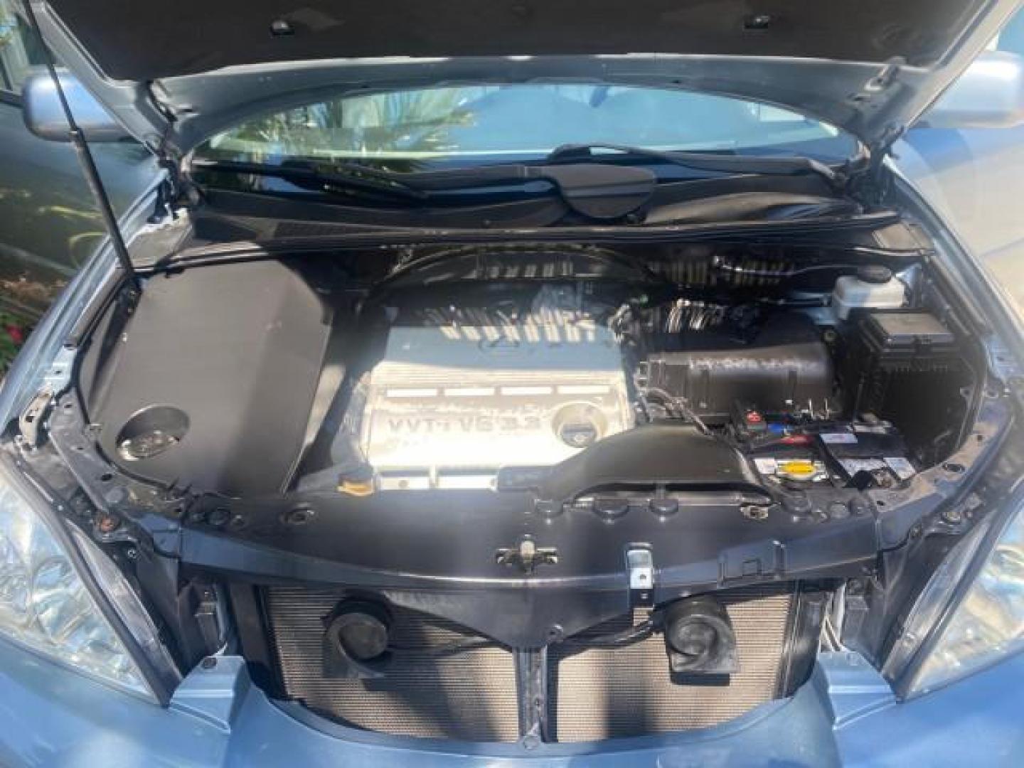 2004 Breakwater Blue Metallic /Light Gray Lexus RX 330 Leather Sunroof CD Cruise Alloy Wheels (2T2GA31U74C) with an 3.3L DOHC MPI 24-Valve V6 Engine engine, Automatic transmission, located at 4701 North Dixie Hwy, Pompano Beach, FL, 33064, (954) 422-2889, 26.240938, -80.123474 - OUR WEBPAGE FLORIDACARS1.COM HAS OVER 100 PHOTOS AND FREE CARFAX LINK 2004 LEXUS RX 330 VIN: 2T2GA31U74C017089 2 T 2 G A 3 1 U 7 4 C 0 1 7 0 8 9 4 DOOR WAGON/SPORT UTILITY 3.3L V6 F 24V GASOLINE FRONT WHEEL DRIVE Highlighted Features Power Sunroof Power Windows Leather Seats 6 Disc CD Changer Alloy - Photo#17