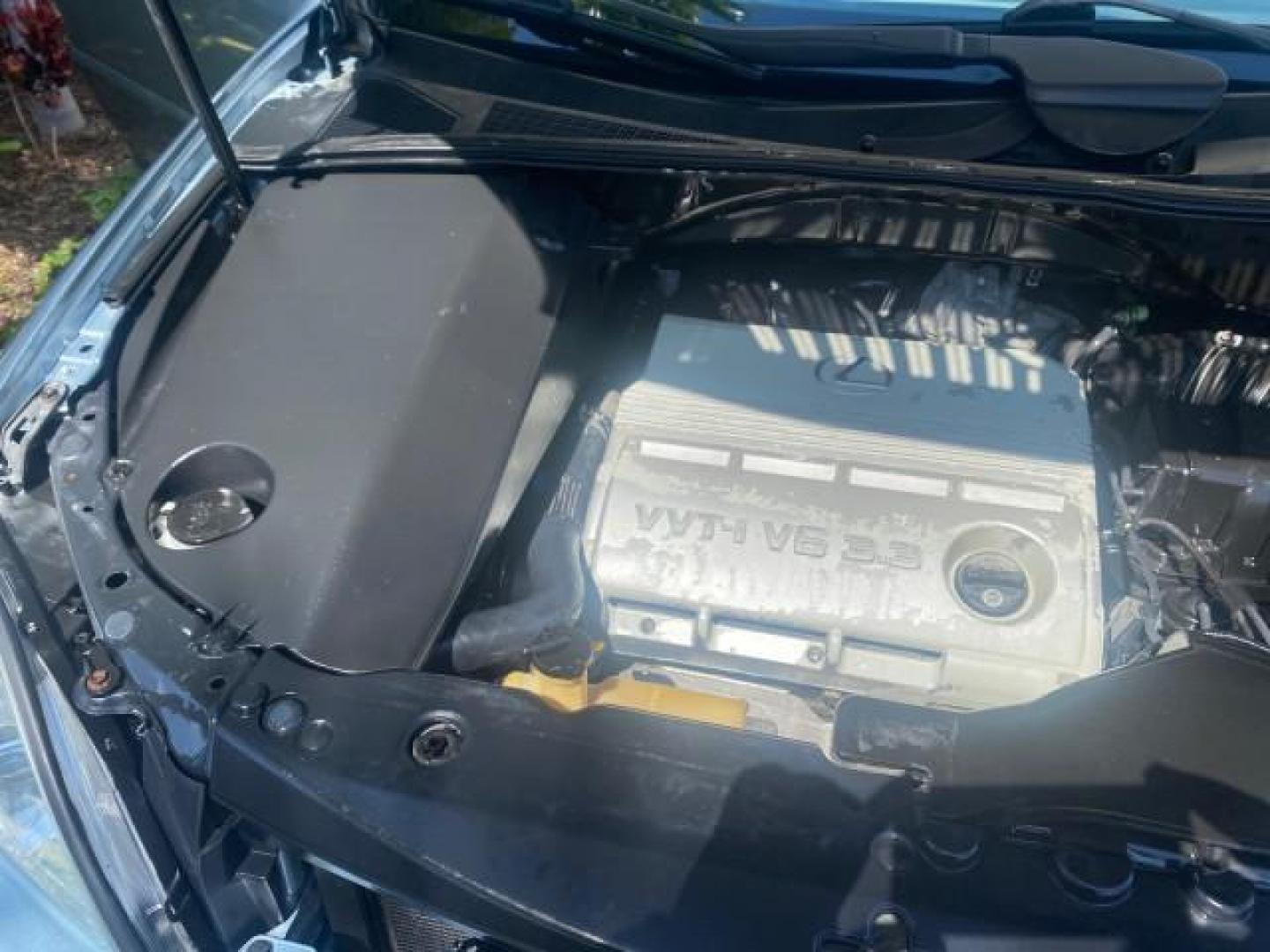 2004 Breakwater Blue Metallic /Light Gray Lexus RX 330 Leather Sunroof CD Cruise Alloy Wheels (2T2GA31U74C) with an 3.3L DOHC MPI 24-Valve V6 Engine engine, Automatic transmission, located at 4701 North Dixie Hwy, Pompano Beach, FL, 33064, (954) 422-2889, 26.240938, -80.123474 - OUR WEBPAGE FLORIDACARS1.COM HAS OVER 100 PHOTOS AND FREE CARFAX LINK 2004 LEXUS RX 330 VIN: 2T2GA31U74C017089 2 T 2 G A 3 1 U 7 4 C 0 1 7 0 8 9 4 DOOR WAGON/SPORT UTILITY 3.3L V6 F 24V GASOLINE FRONT WHEEL DRIVE Highlighted Features Power Sunroof Power Windows Leather Seats 6 Disc CD Changer Alloy - Photo#25