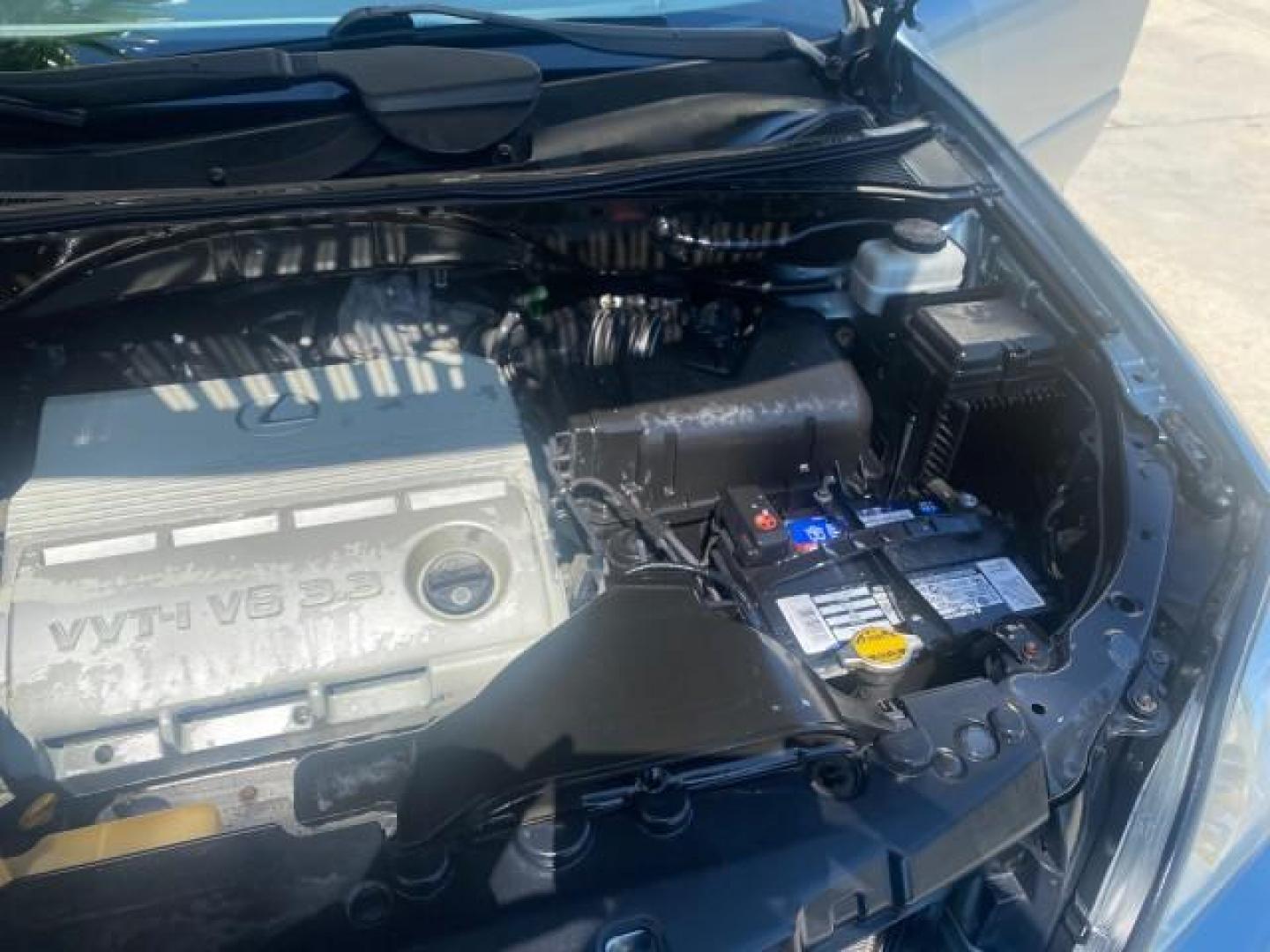 2004 Breakwater Blue Metallic /Light Gray Lexus RX 330 Leather Sunroof CD Cruise Alloy Wheels (2T2GA31U74C) with an 3.3L DOHC MPI 24-Valve V6 Engine engine, Automatic transmission, located at 4701 North Dixie Hwy, Pompano Beach, FL, 33064, (954) 422-2889, 26.240938, -80.123474 - OUR WEBPAGE FLORIDACARS1.COM HAS OVER 100 PHOTOS AND FREE CARFAX LINK 2004 LEXUS RX 330 VIN: 2T2GA31U74C017089 2 T 2 G A 3 1 U 7 4 C 0 1 7 0 8 9 4 DOOR WAGON/SPORT UTILITY 3.3L V6 F 24V GASOLINE FRONT WHEEL DRIVE Highlighted Features Power Sunroof Power Windows Leather Seats 6 Disc CD Changer Alloy - Photo#26