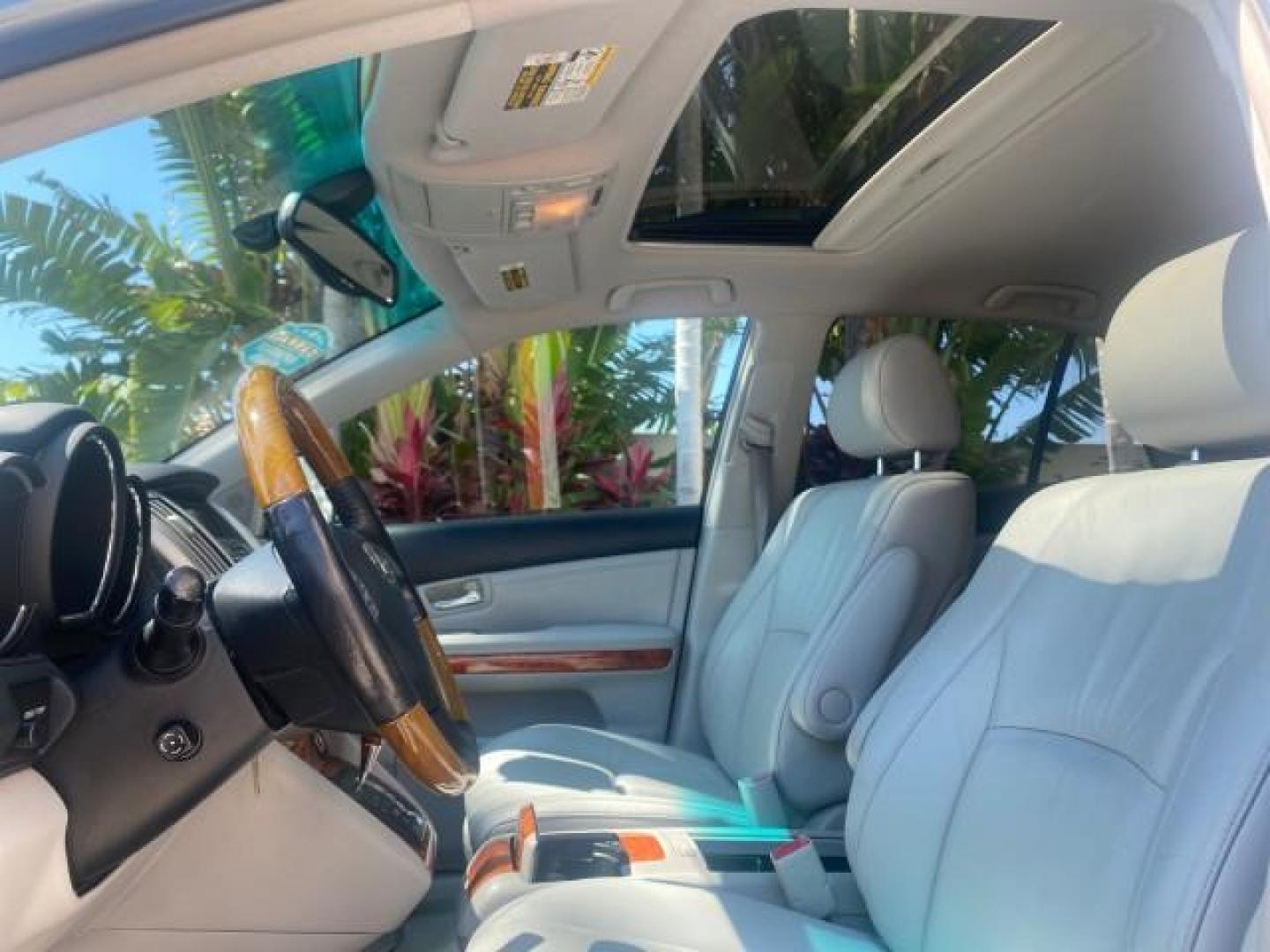 2004 Breakwater Blue Metallic /Light Gray Lexus RX 330 Leather Sunroof CD Cruise Alloy Wheels (2T2GA31U74C) with an 3.3L DOHC MPI 24-Valve V6 Engine engine, Automatic transmission, located at 4701 North Dixie Hwy, Pompano Beach, FL, 33064, (954) 422-2889, 26.240938, -80.123474 - OUR WEBPAGE FLORIDACARS1.COM HAS OVER 100 PHOTOS AND FREE CARFAX LINK 2004 LEXUS RX 330 VIN: 2T2GA31U74C017089 2 T 2 G A 3 1 U 7 4 C 0 1 7 0 8 9 4 DOOR WAGON/SPORT UTILITY 3.3L V6 F 24V GASOLINE FRONT WHEEL DRIVE Highlighted Features Power Sunroof Power Windows Leather Seats 6 Disc CD Changer Alloy - Photo#30