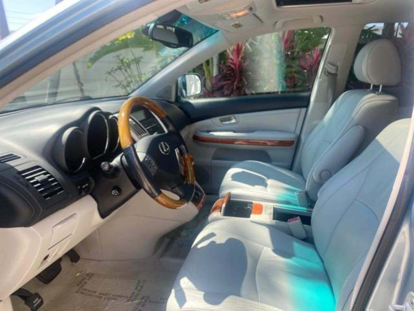 2004 Breakwater Blue Metallic /Light Gray Lexus RX 330 Leather Sunroof CD Cruise Alloy Wheels (2T2GA31U74C) with an 3.3L DOHC MPI 24-Valve V6 Engine engine, Automatic transmission, located at 4701 North Dixie Hwy, Pompano Beach, FL, 33064, (954) 422-2889, 26.240938, -80.123474 - OUR WEBPAGE FLORIDACARS1.COM HAS OVER 100 PHOTOS AND FREE CARFAX LINK 2004 LEXUS RX 330 VIN: 2T2GA31U74C017089 2 T 2 G A 3 1 U 7 4 C 0 1 7 0 8 9 4 DOOR WAGON/SPORT UTILITY 3.3L V6 F 24V GASOLINE FRONT WHEEL DRIVE Highlighted Features Power Sunroof Power Windows Leather Seats 6 Disc CD Changer Alloy - Photo#31