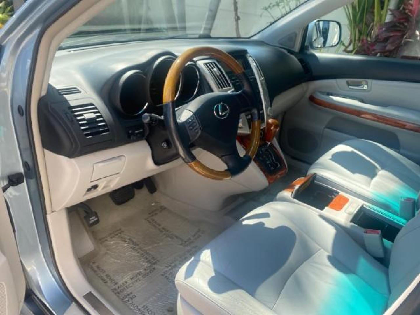 2004 Breakwater Blue Metallic /Light Gray Lexus RX 330 Leather Sunroof CD Cruise Alloy Wheels (2T2GA31U74C) with an 3.3L DOHC MPI 24-Valve V6 Engine engine, Automatic transmission, located at 4701 North Dixie Hwy, Pompano Beach, FL, 33064, (954) 422-2889, 26.240938, -80.123474 - OUR WEBPAGE FLORIDACARS1.COM HAS OVER 100 PHOTOS AND FREE CARFAX LINK 2004 LEXUS RX 330 VIN: 2T2GA31U74C017089 2 T 2 G A 3 1 U 7 4 C 0 1 7 0 8 9 4 DOOR WAGON/SPORT UTILITY 3.3L V6 F 24V GASOLINE FRONT WHEEL DRIVE Highlighted Features Power Sunroof Power Windows Leather Seats 6 Disc CD Changer Alloy - Photo#32