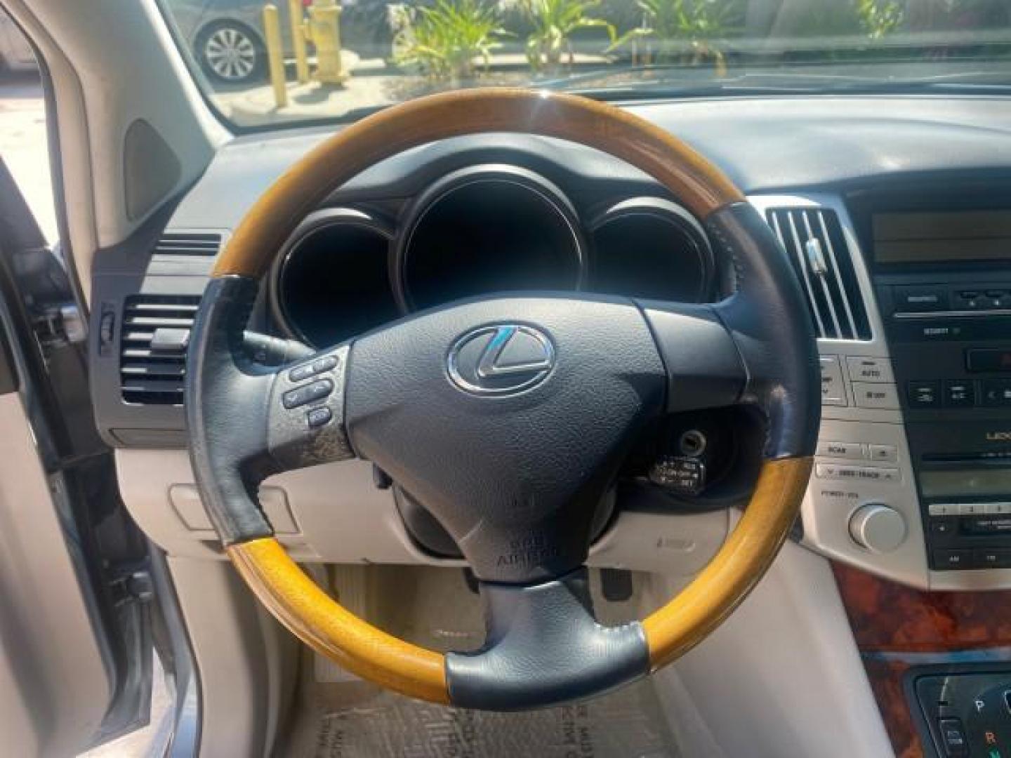2004 Breakwater Blue Metallic /Light Gray Lexus RX 330 Leather Sunroof CD Cruise Alloy Wheels (2T2GA31U74C) with an 3.3L DOHC MPI 24-Valve V6 Engine engine, Automatic transmission, located at 4701 North Dixie Hwy, Pompano Beach, FL, 33064, (954) 422-2889, 26.240938, -80.123474 - OUR WEBPAGE FLORIDACARS1.COM HAS OVER 100 PHOTOS AND FREE CARFAX LINK 2004 LEXUS RX 330 VIN: 2T2GA31U74C017089 2 T 2 G A 3 1 U 7 4 C 0 1 7 0 8 9 4 DOOR WAGON/SPORT UTILITY 3.3L V6 F 24V GASOLINE FRONT WHEEL DRIVE Highlighted Features Power Sunroof Power Windows Leather Seats 6 Disc CD Changer Alloy - Photo#33