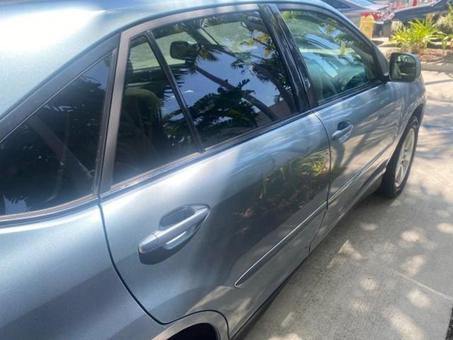 2004 Breakwater Blue Metallic /Light Gray Lexus RX 330 Leather Sunroof CD Cruise Alloy Wheels (2T2GA31U74C) with an 3.3L DOHC MPI 24-Valve V6 Engine engine, Automatic transmission, located at 4701 North Dixie Hwy, Pompano Beach, FL, 33064, (954) 422-2889, 26.240938, -80.123474 - OUR WEBPAGE FLORIDACARS1.COM HAS OVER 100 PHOTOS AND FREE CARFAX LINK 2004 LEXUS RX 330 VIN: 2T2GA31U74C017089 2 T 2 G A 3 1 U 7 4 C 0 1 7 0 8 9 4 DOOR WAGON/SPORT UTILITY 3.3L V6 F 24V GASOLINE FRONT WHEEL DRIVE Highlighted Features Power Sunroof Power Windows Leather Seats 6 Disc CD Changer Alloy - Photo#76