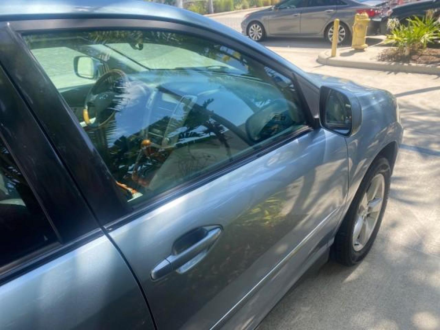 2004 Breakwater Blue Metallic /Light Gray Lexus RX 330 Leather Sunroof CD Cruise Alloy Wheels (2T2GA31U74C) with an 3.3L DOHC MPI 24-Valve V6 Engine engine, Automatic transmission, located at 4701 North Dixie Hwy, Pompano Beach, FL, 33064, (954) 422-2889, 26.240938, -80.123474 - OUR WEBPAGE FLORIDACARS1.COM HAS OVER 100 PHOTOS AND FREE CARFAX LINK 2004 LEXUS RX 330 VIN: 2T2GA31U74C017089 2 T 2 G A 3 1 U 7 4 C 0 1 7 0 8 9 4 DOOR WAGON/SPORT UTILITY 3.3L V6 F 24V GASOLINE FRONT WHEEL DRIVE Highlighted Features Power Sunroof Power Windows Leather Seats 6 Disc CD Changer Alloy - Photo#83